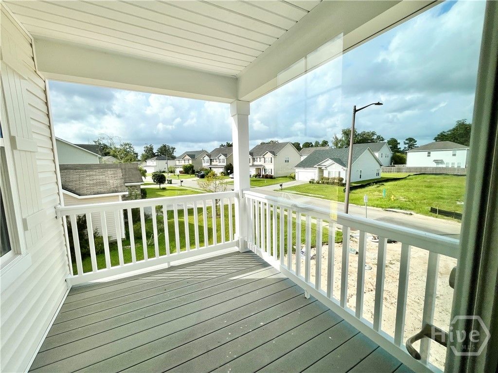 Private balcony off primary bedroom.