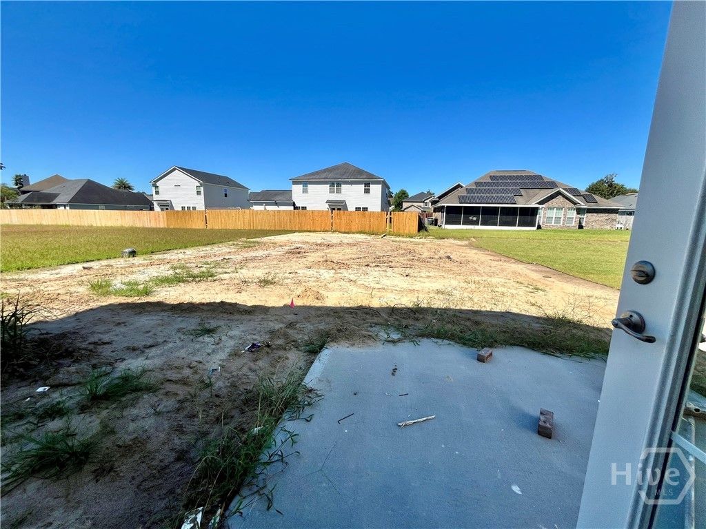 Large back yard. Will be sodded with irrigation/sp