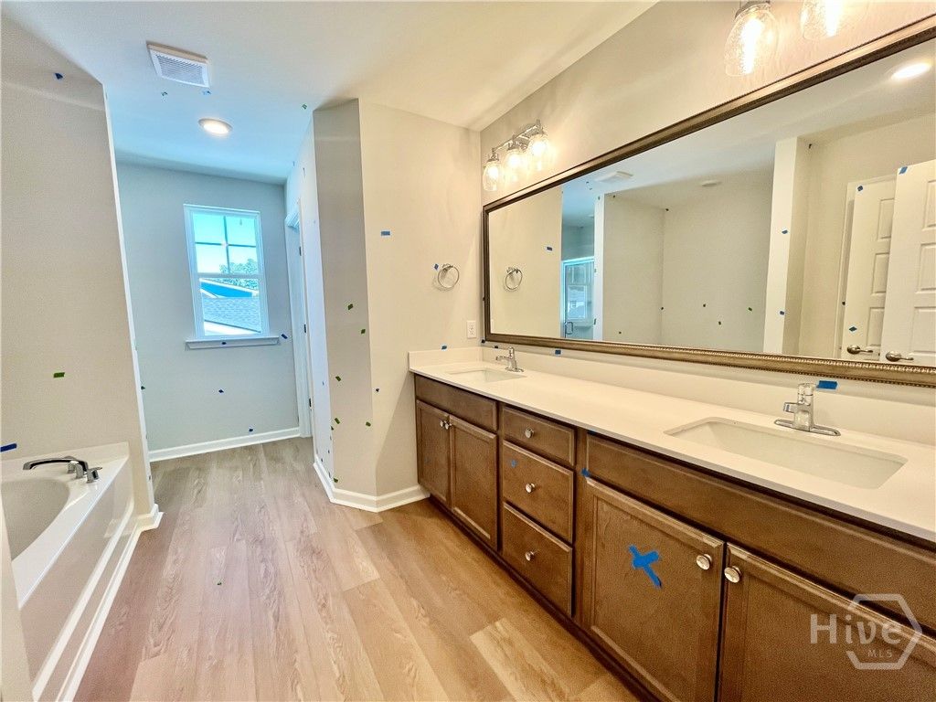 Primary bathroom w/ separate shower & tub