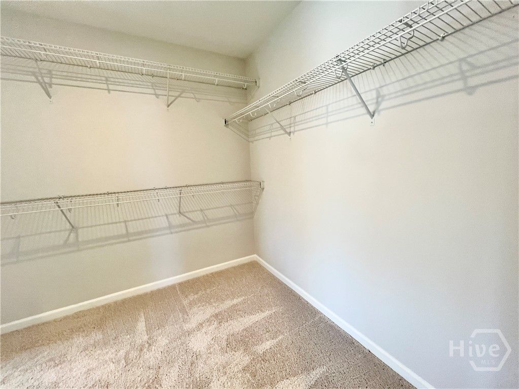 Huge walk-in primary closet!