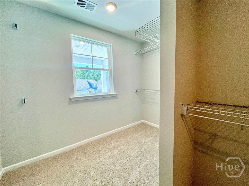 Huge walk-in primary closet!