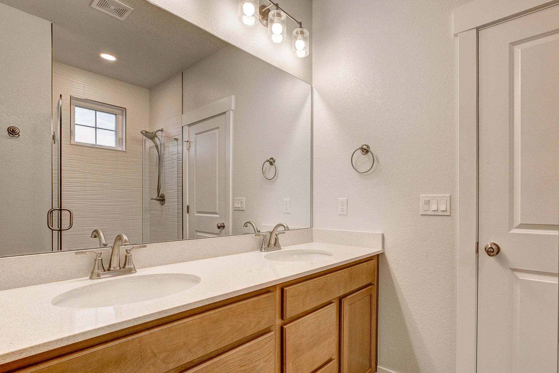 Main Floor Primary Suite - Not Actual Home - Finishes May Vary