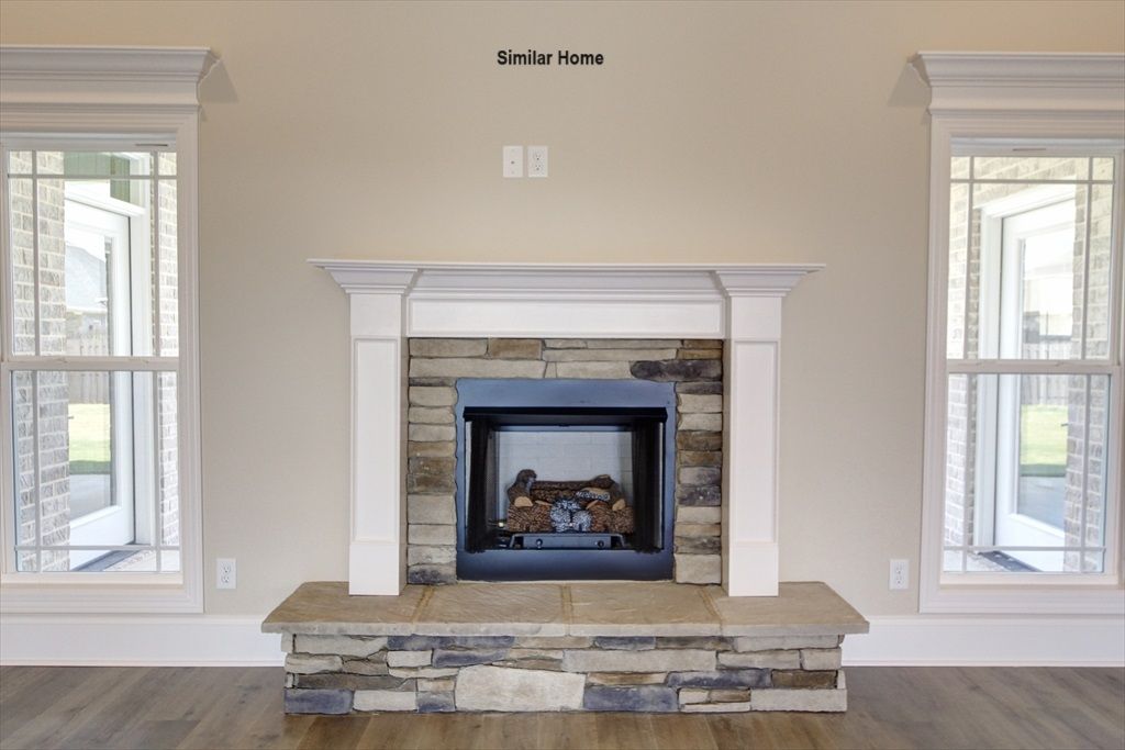 Family Gas Fireplace Stone Surround