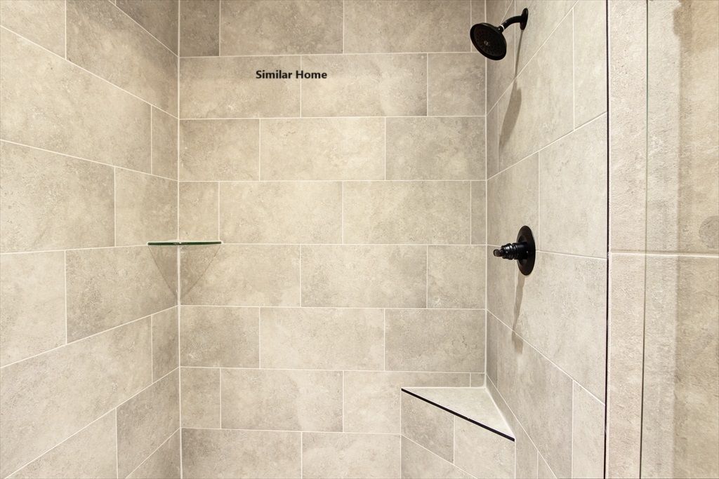 MasterBath Tiled Shower With Seat