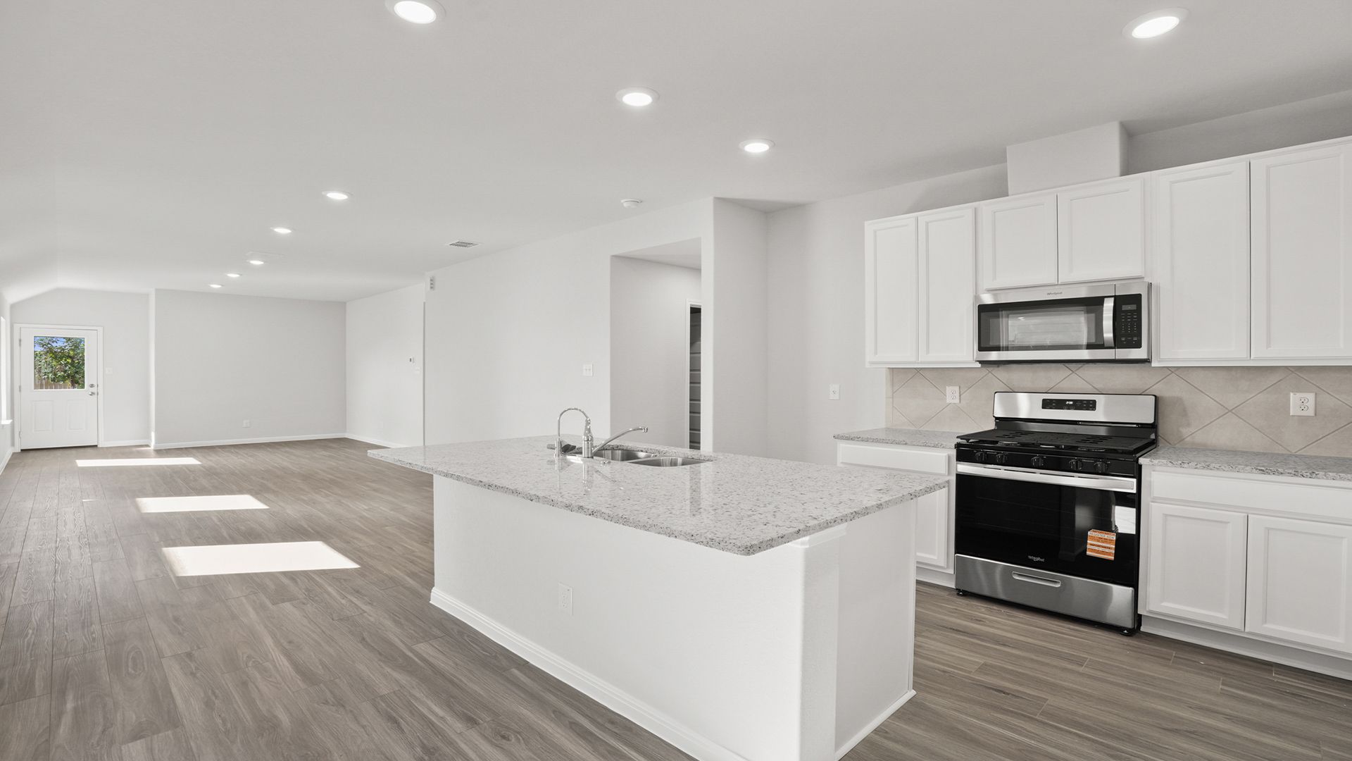 Dining and Kitchen to Family Room