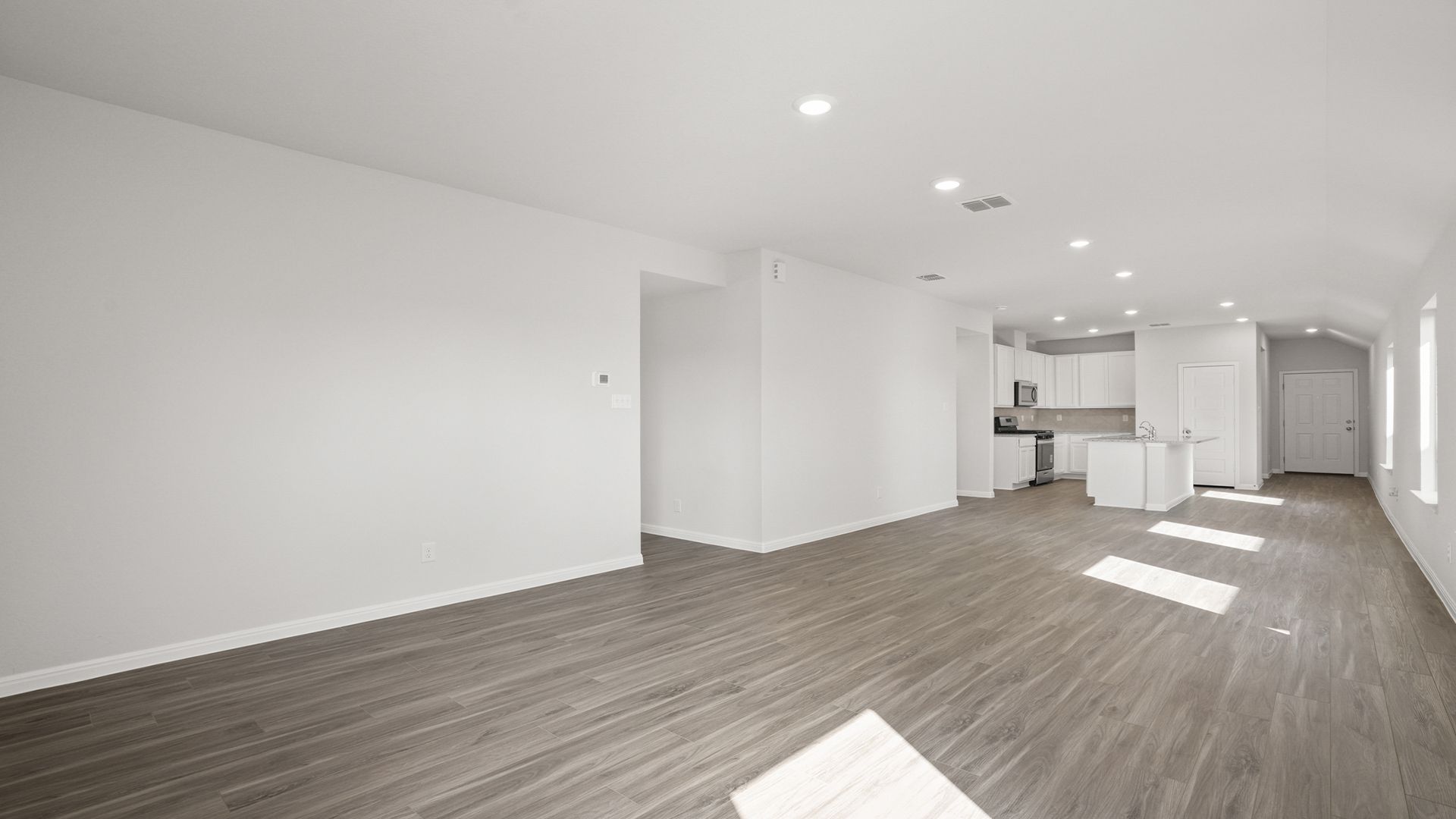 Family Room to Dining and Kitchen