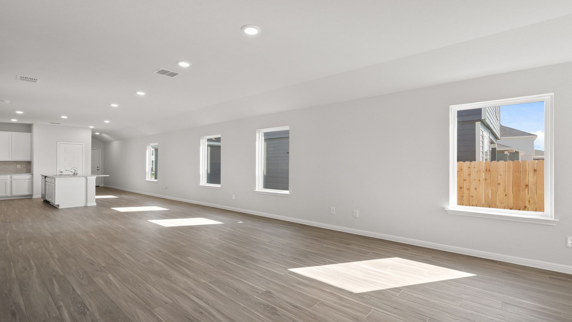 Family Room to Dining and Kitchen