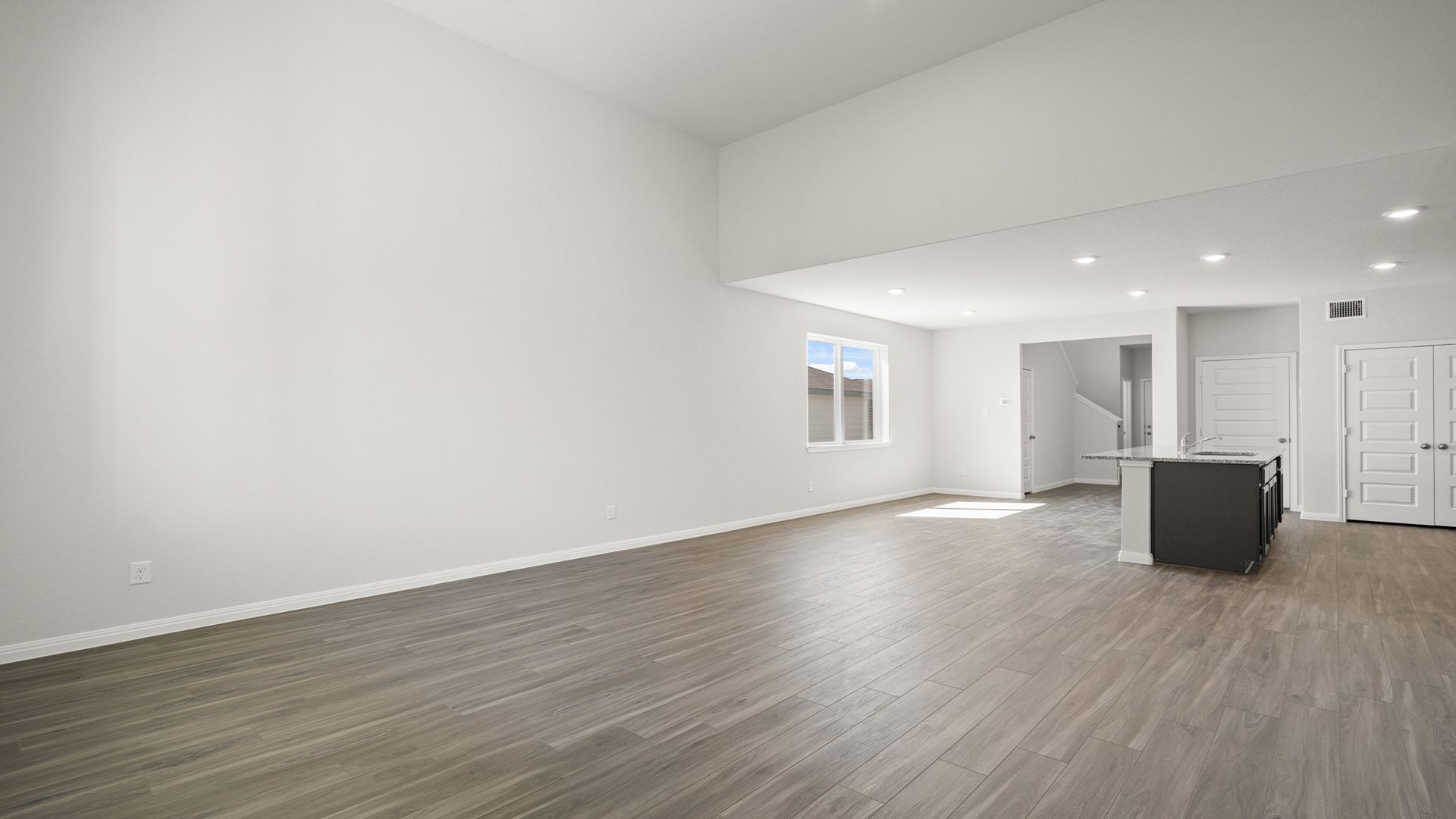 Family Room to Dining and Kitchen