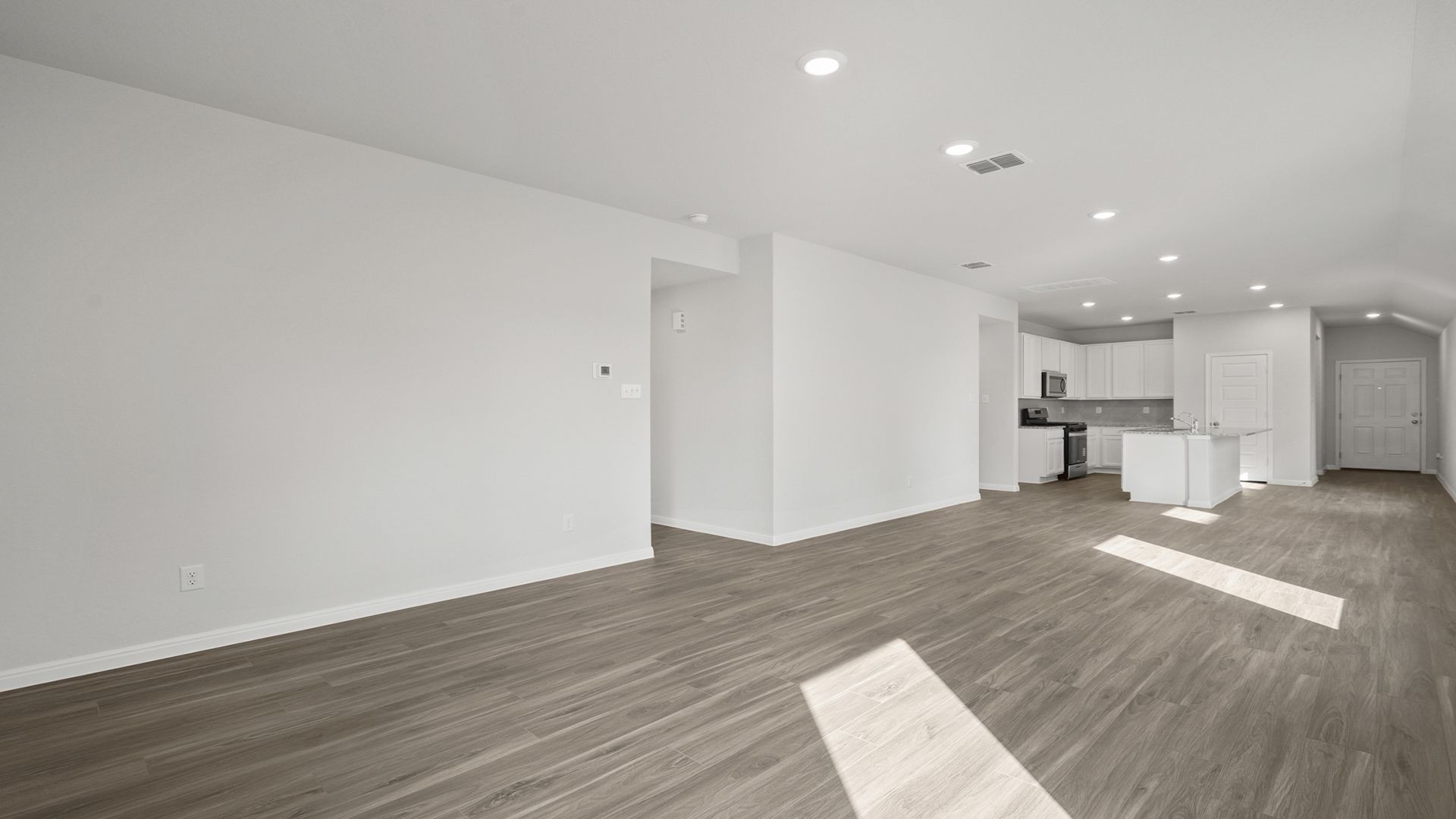 Family Room to Dining and Kitchen