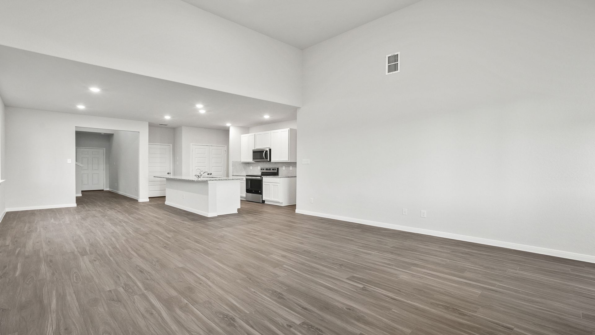Family Room to Dining and Kitchen