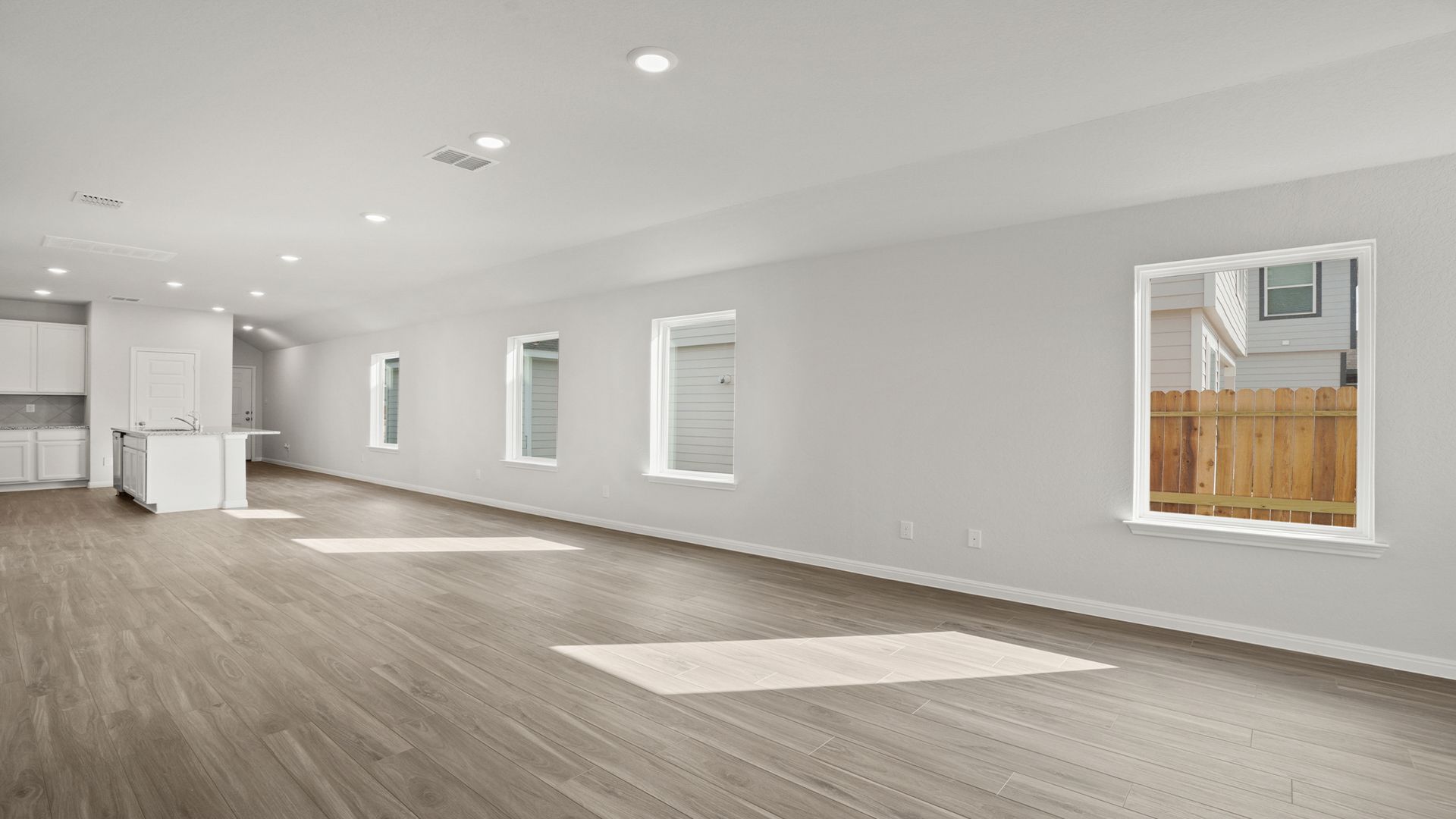 Family Room to Dining and Kitchen