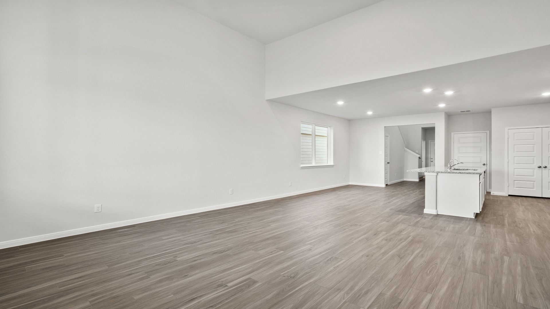 Family Room to Dining and Kitchen
