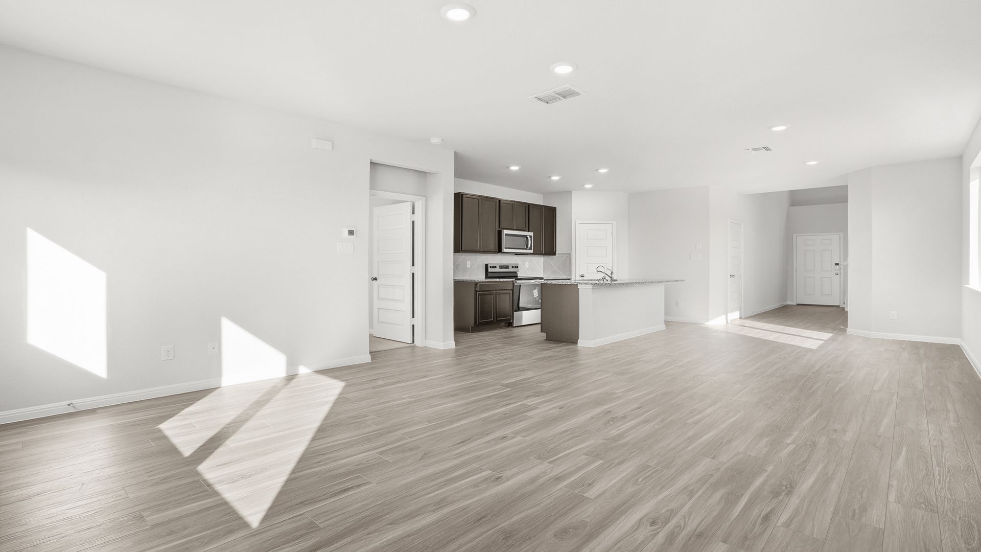 Family Room to Kitchen and Dining Area