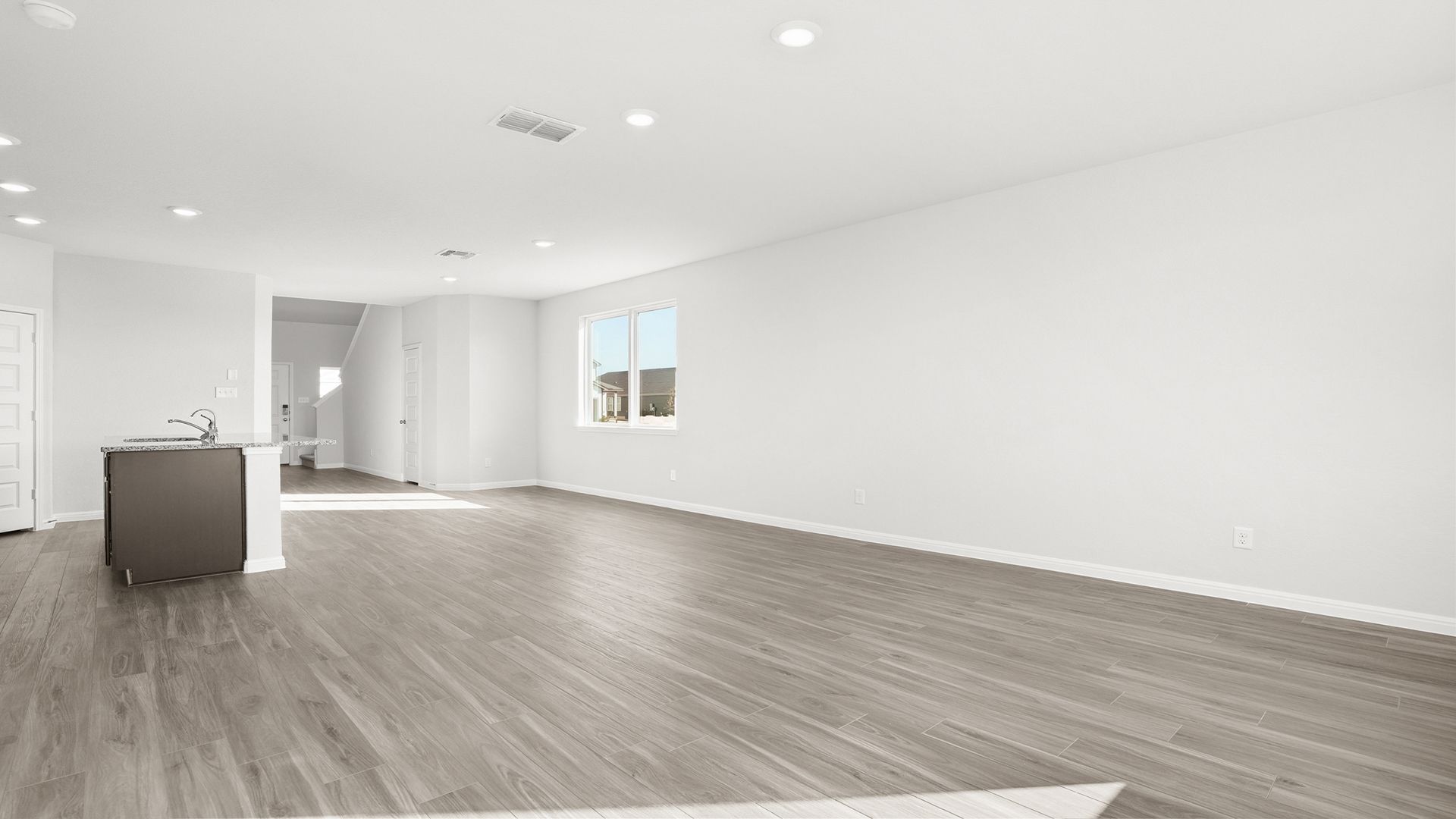 Family Room to Kitchen and Dining Area