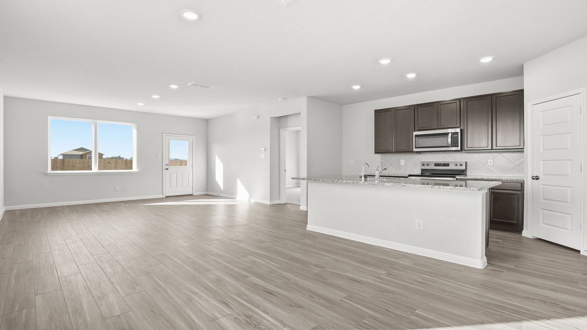 Dining Area to Kitchen and Family Room