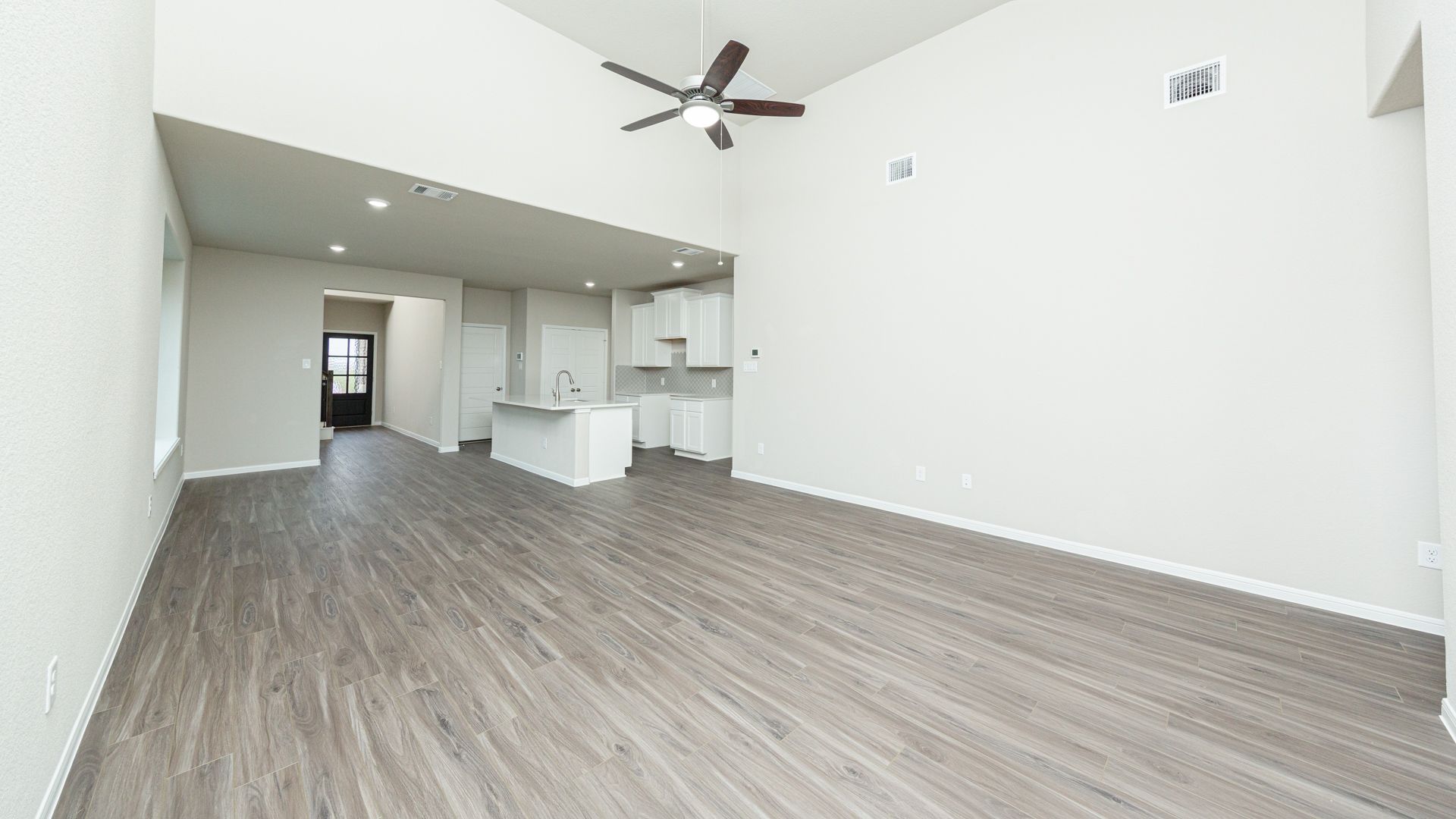 Family Room to Dining Area and Kitchen