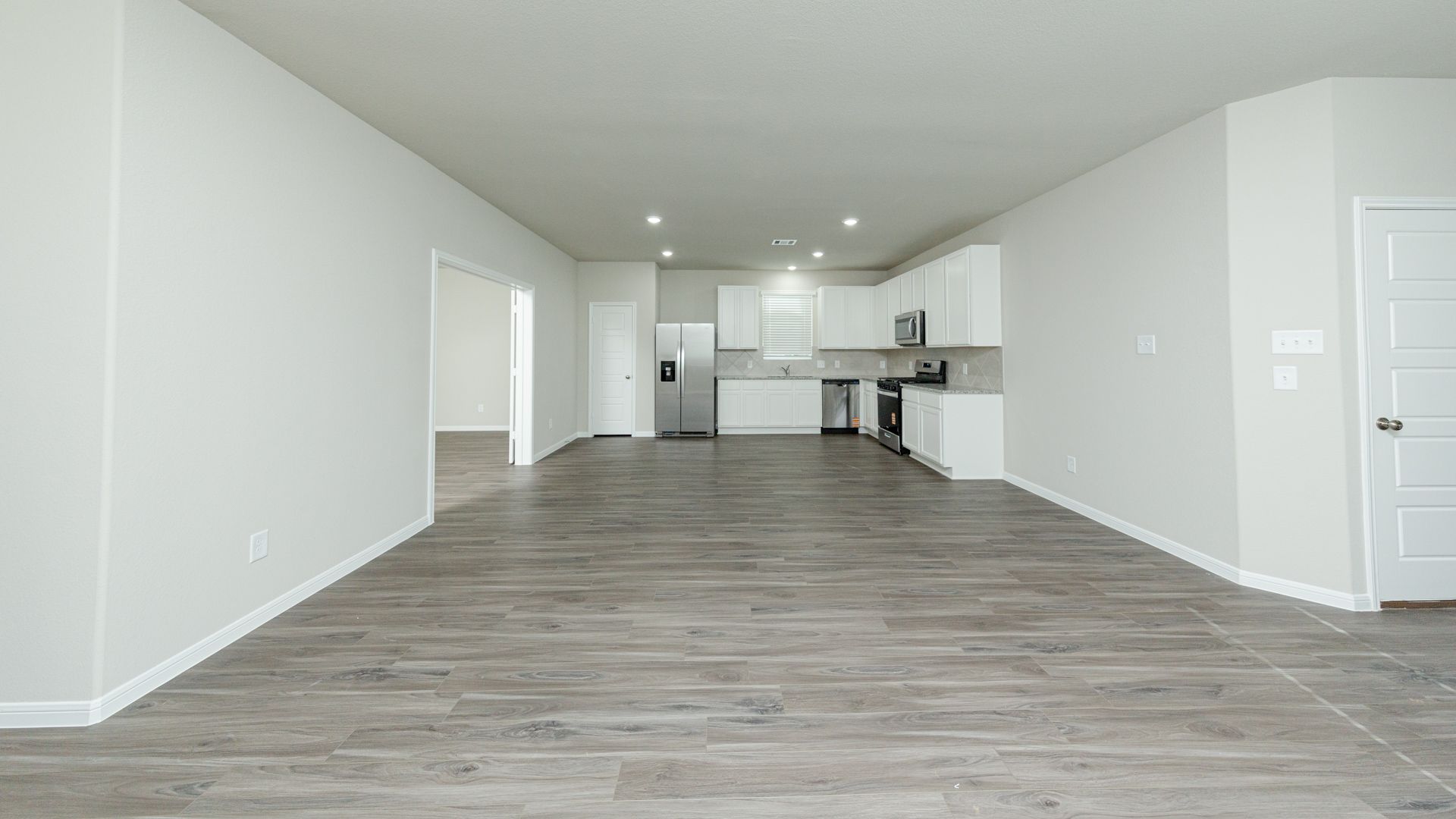 Family Room to Dining Area, Kitchen, and Flex Room