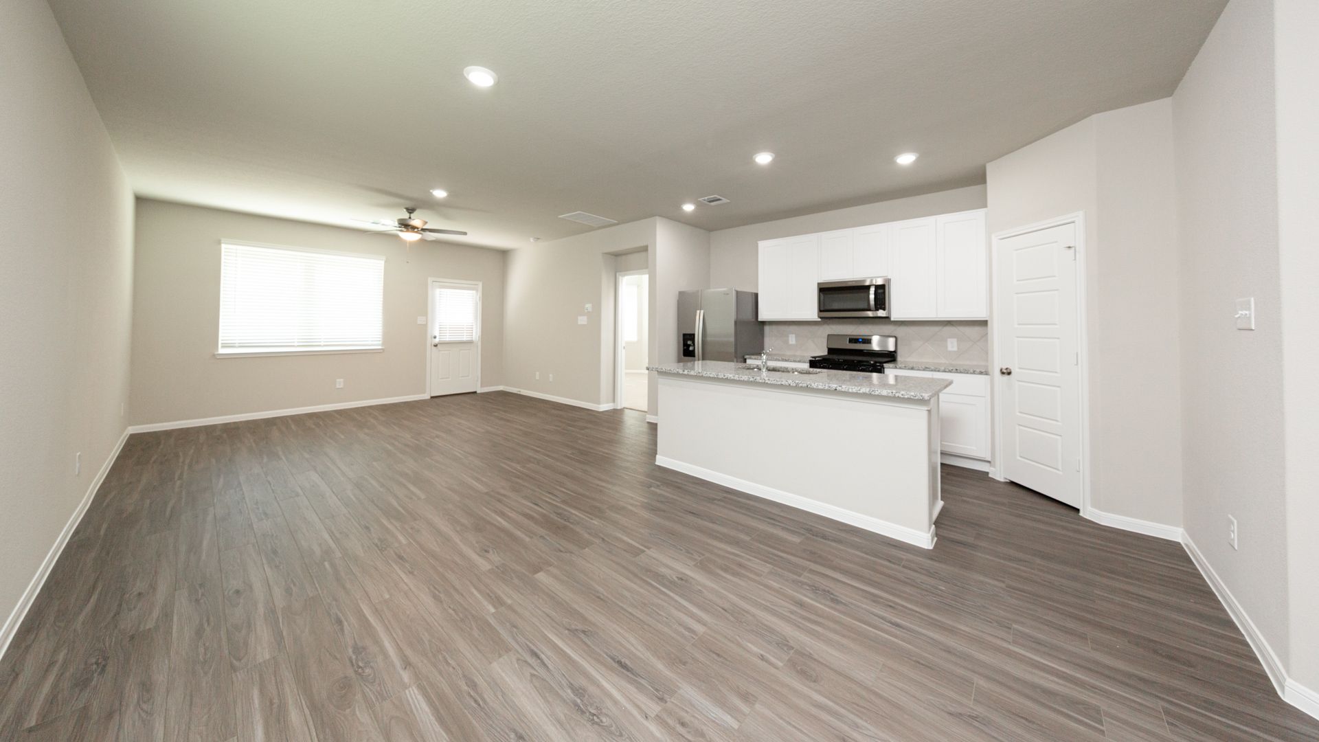 Dining Area to Kitchen and Family Room