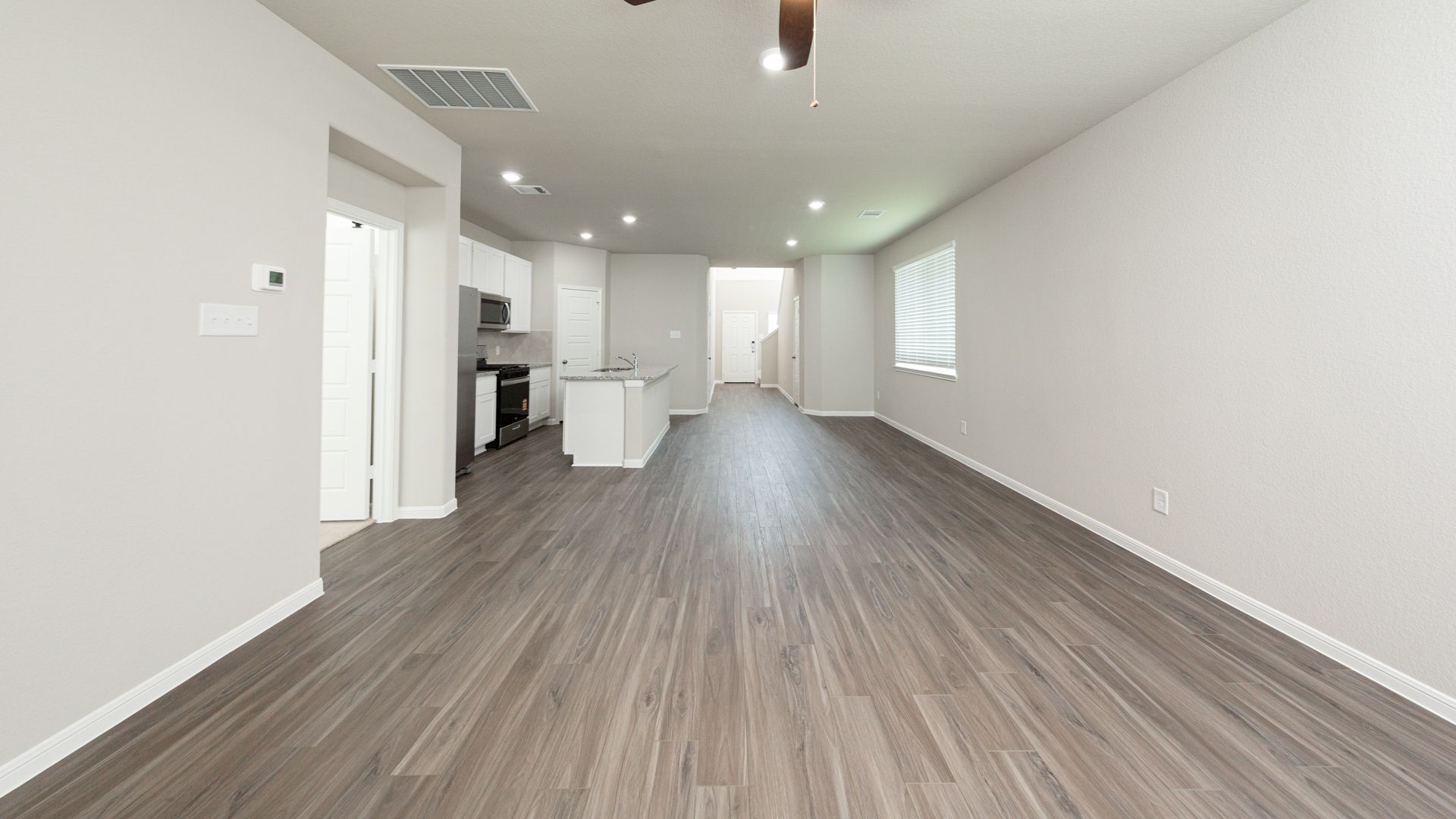 Family Room to Dining Area and Kitchen