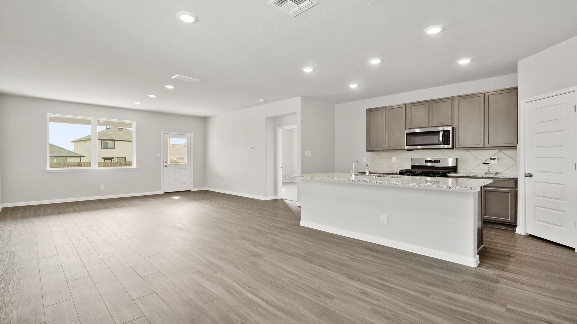 Dining and Kitchen to Family Room