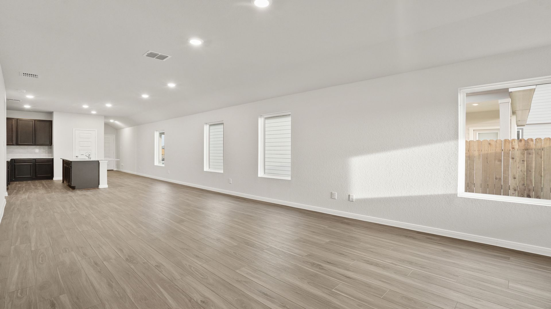 Family Room to Dining and Kitchen