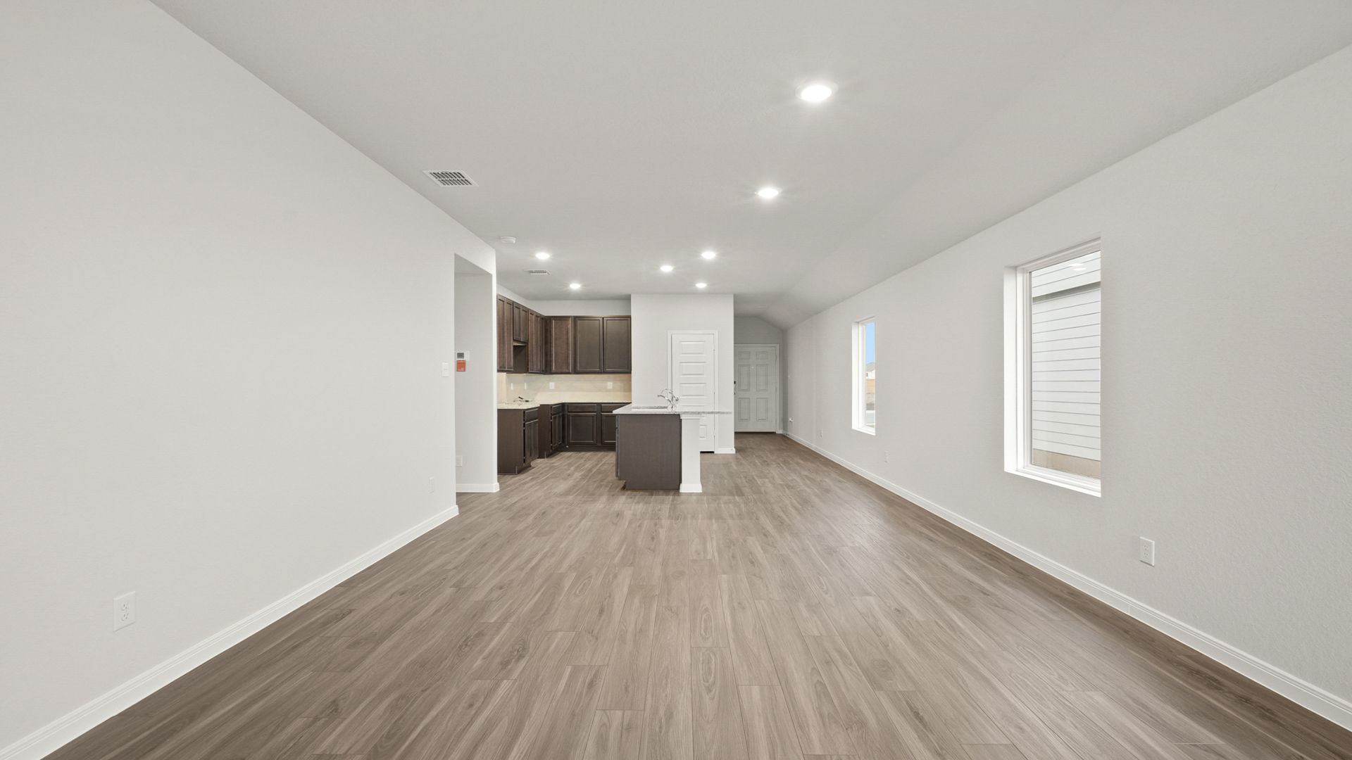 Family Room to Dining and Kitchen