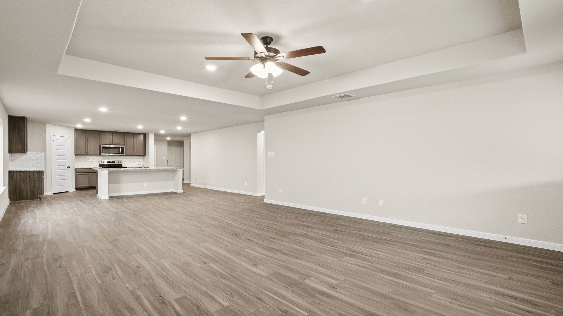 Family Room to Dining and Kitchen