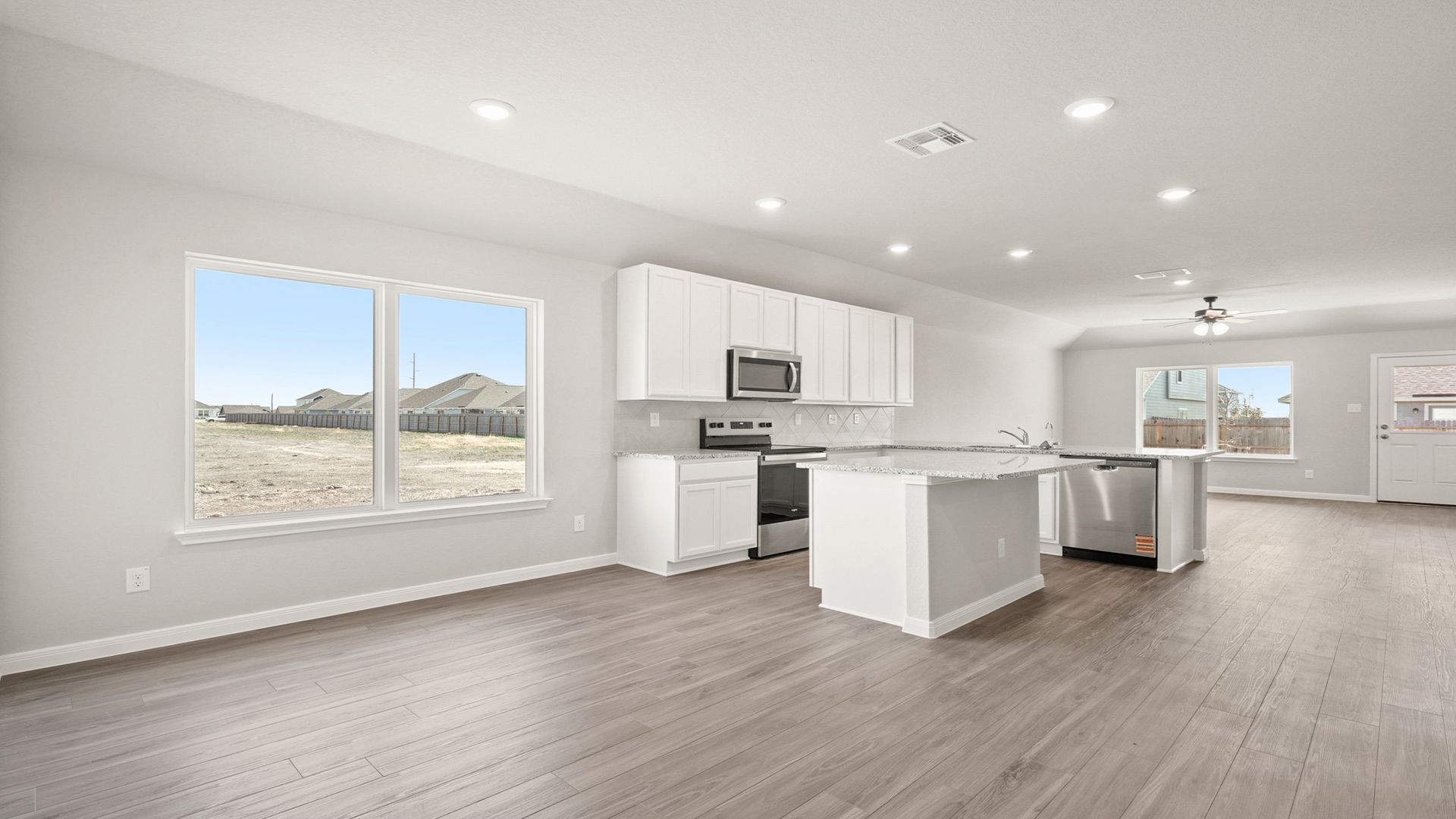 Dining to Kitchen and Family Room