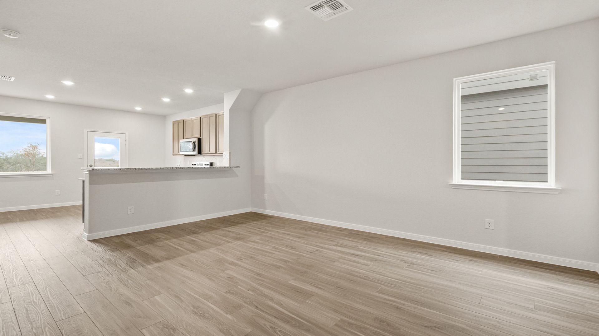 Family Room to Dining and Kitchen