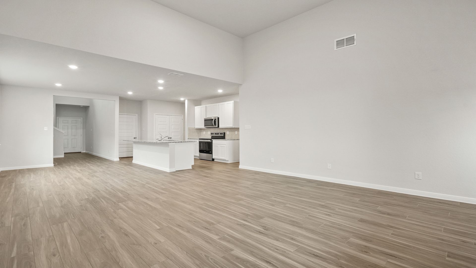 Family Room to Dining and Kitchen
