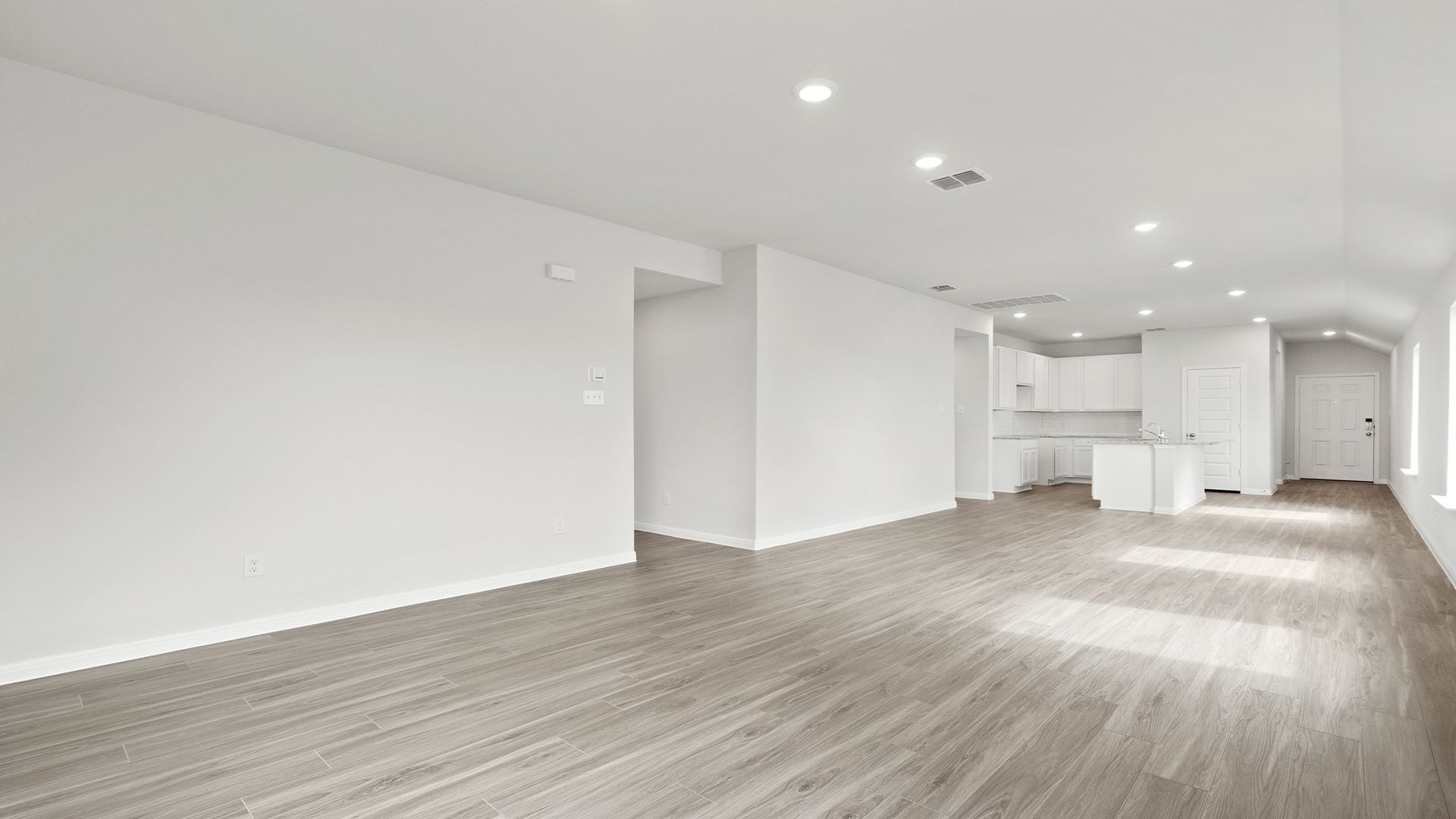 Family Room to Dining and Kitchen