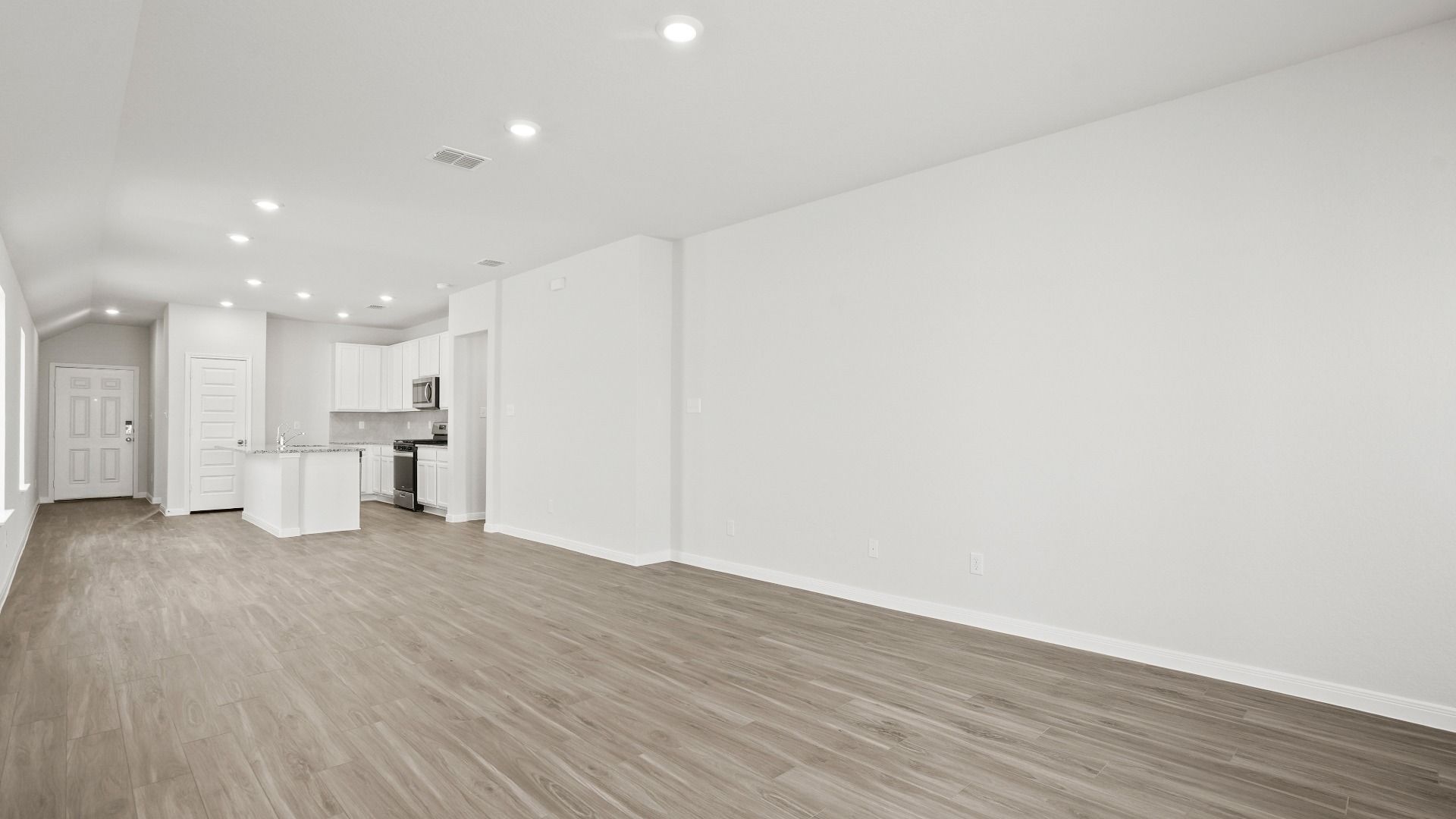 Family Room to Dining and Kitchen