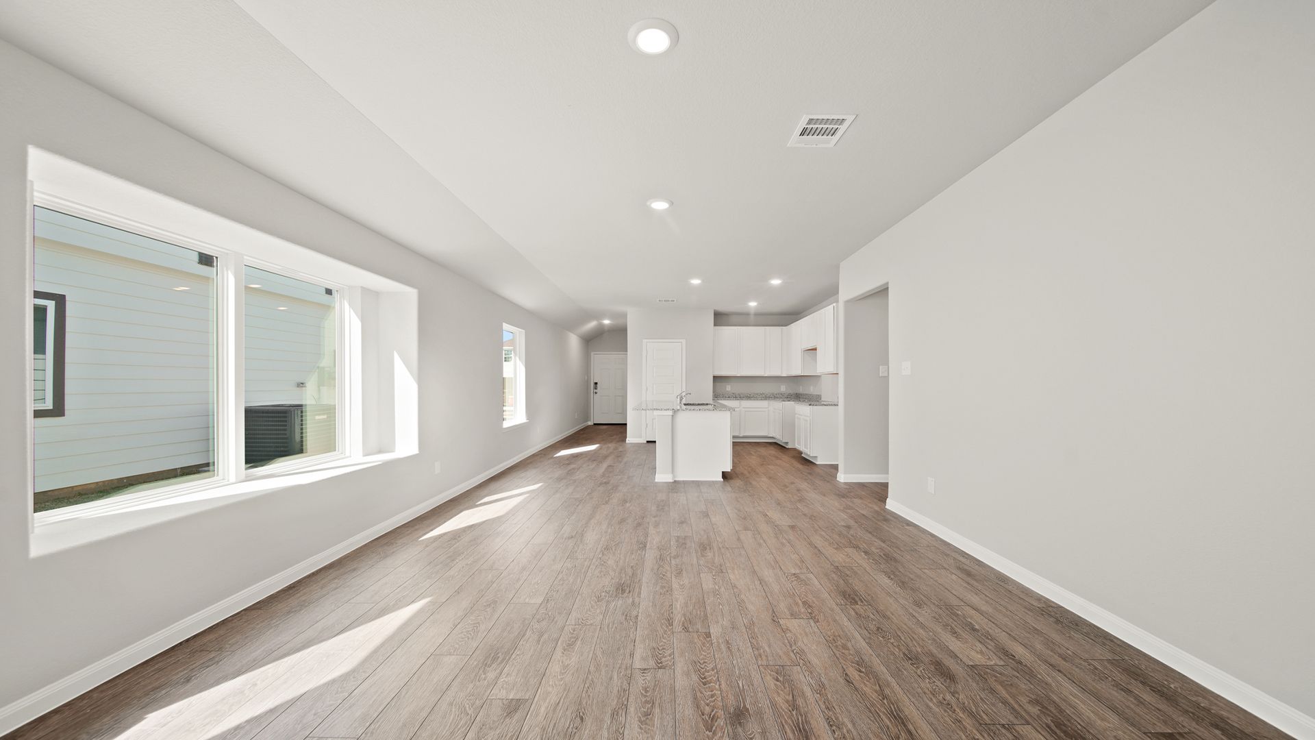 Family Room to Dining Area and Kitchen