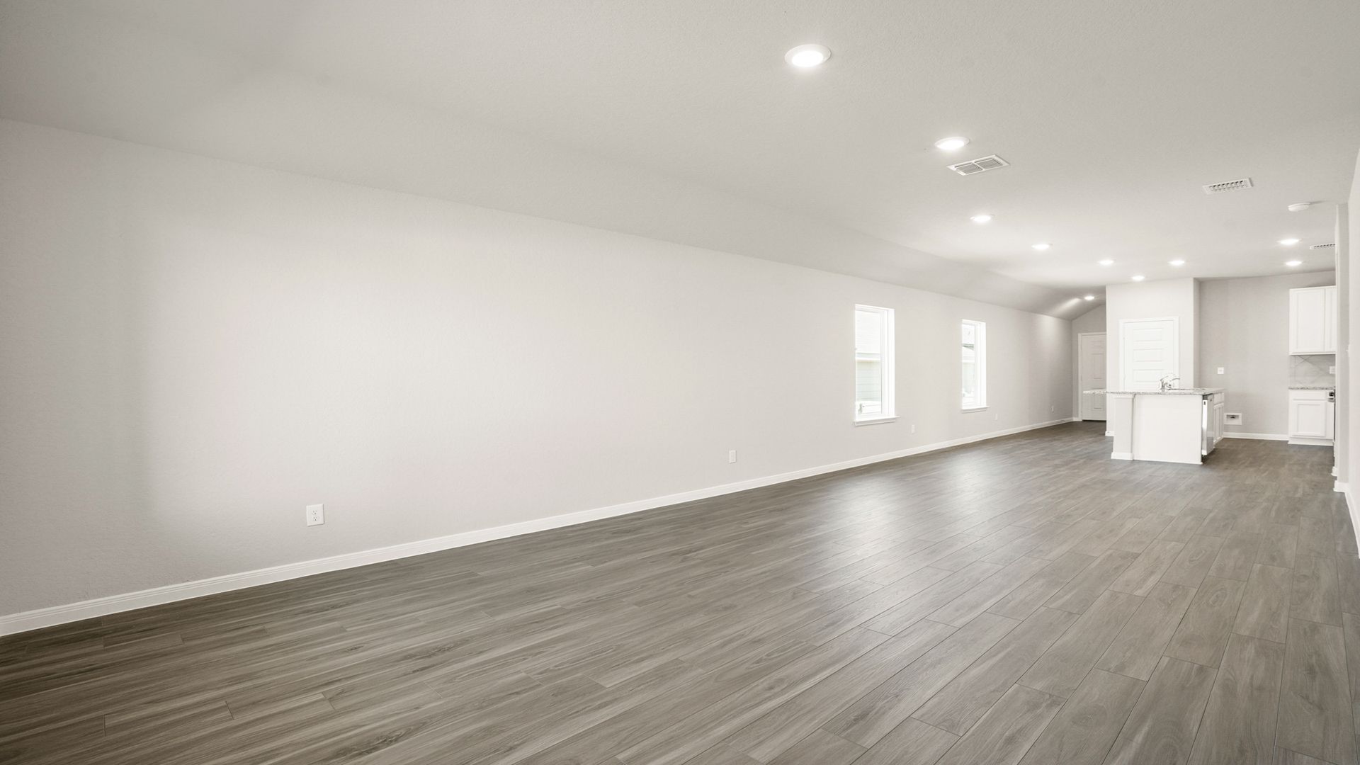 Family Room to Dining and Kitchen
