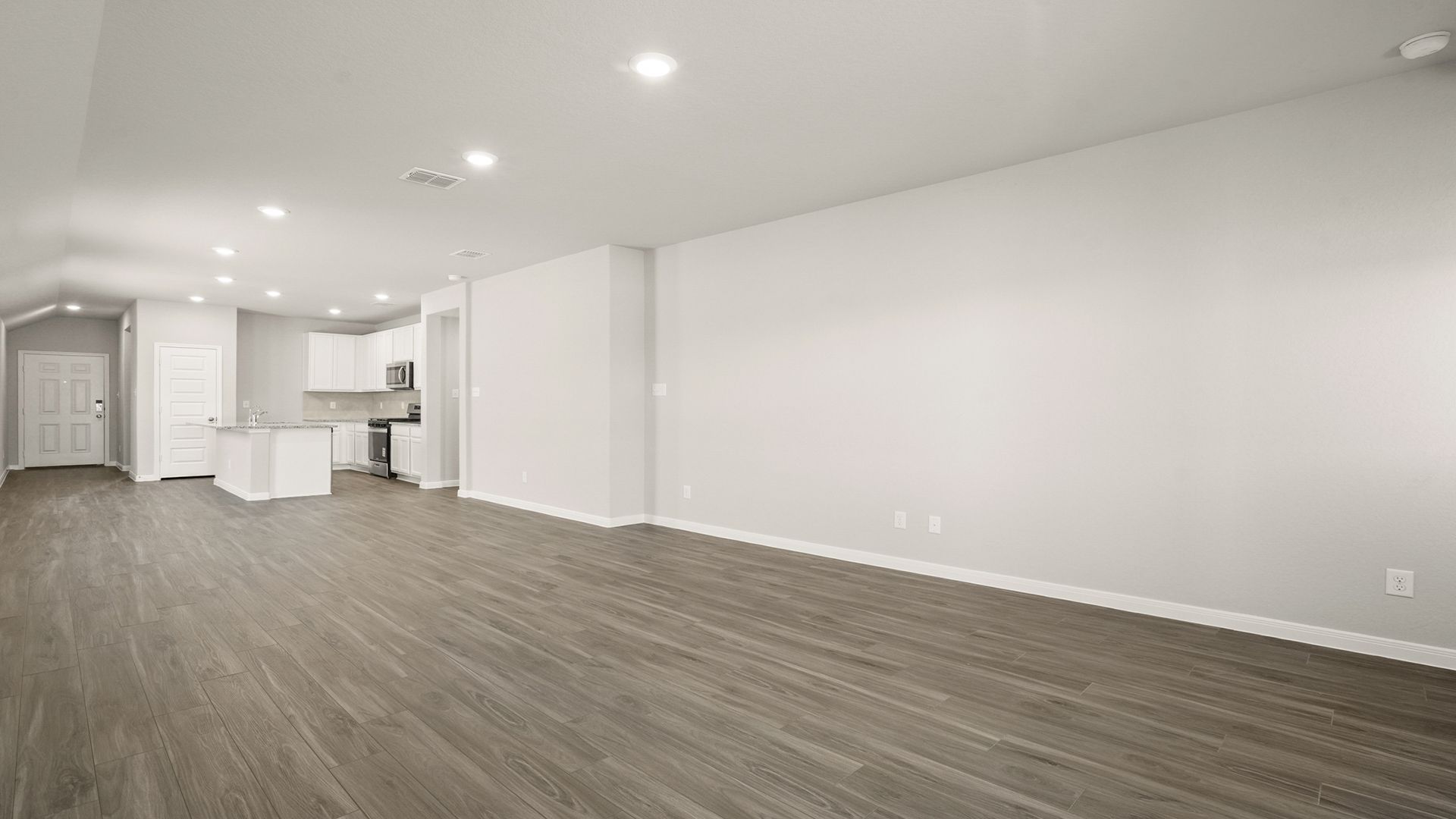 Family Room to Dining and Kitchen