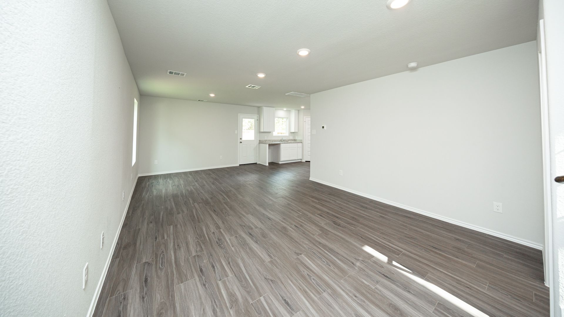 Family Room to Dining and Kitchen