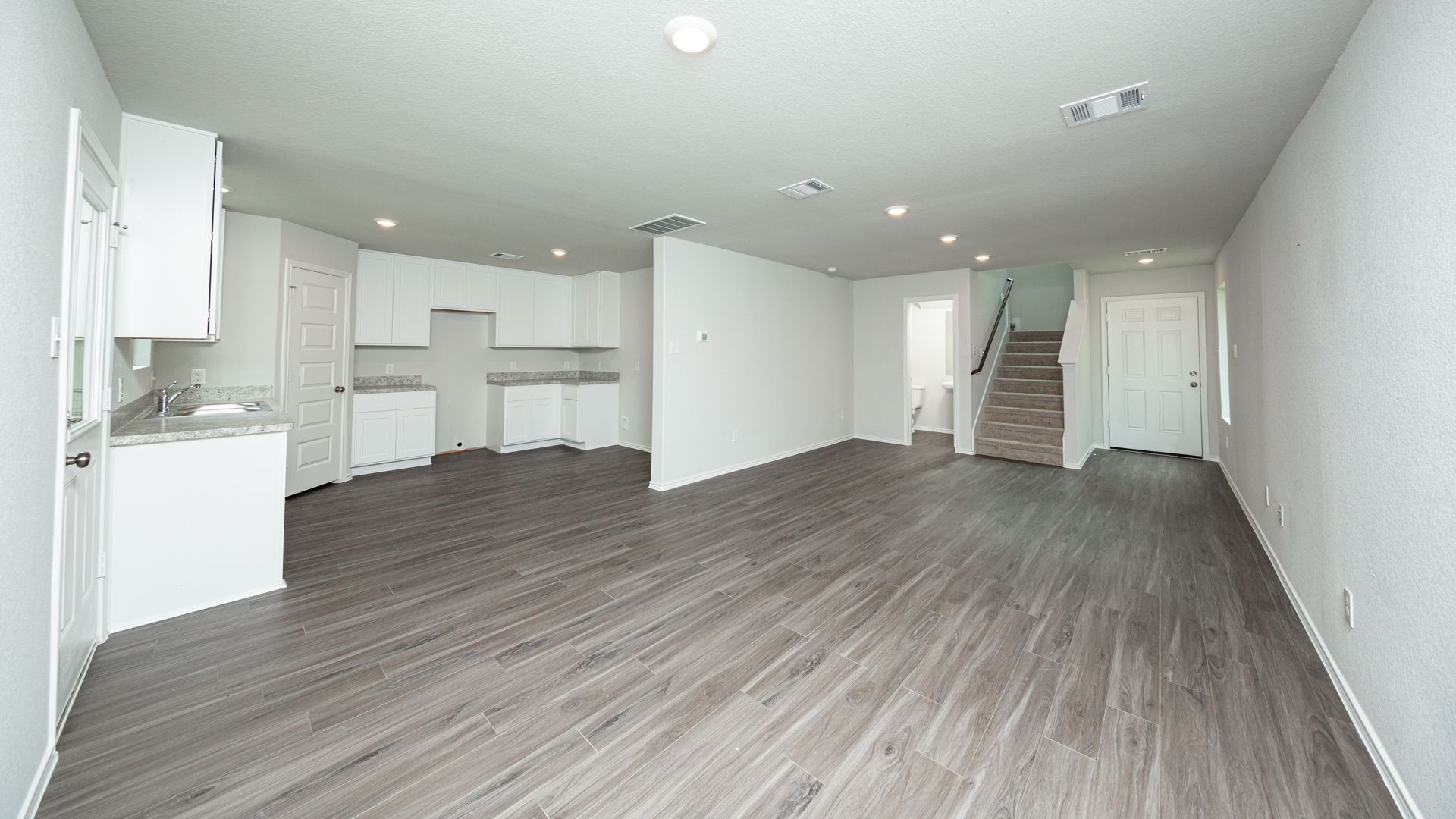 Dining Area to Kitchen and Family Room