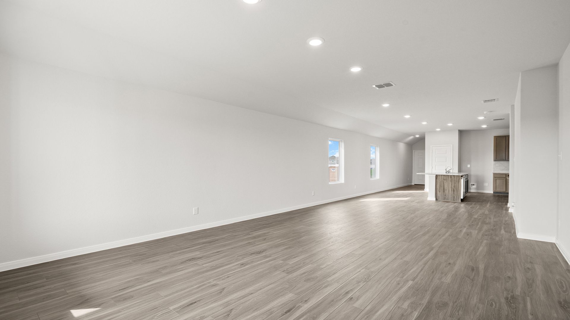 Family room to dining area and kitchen