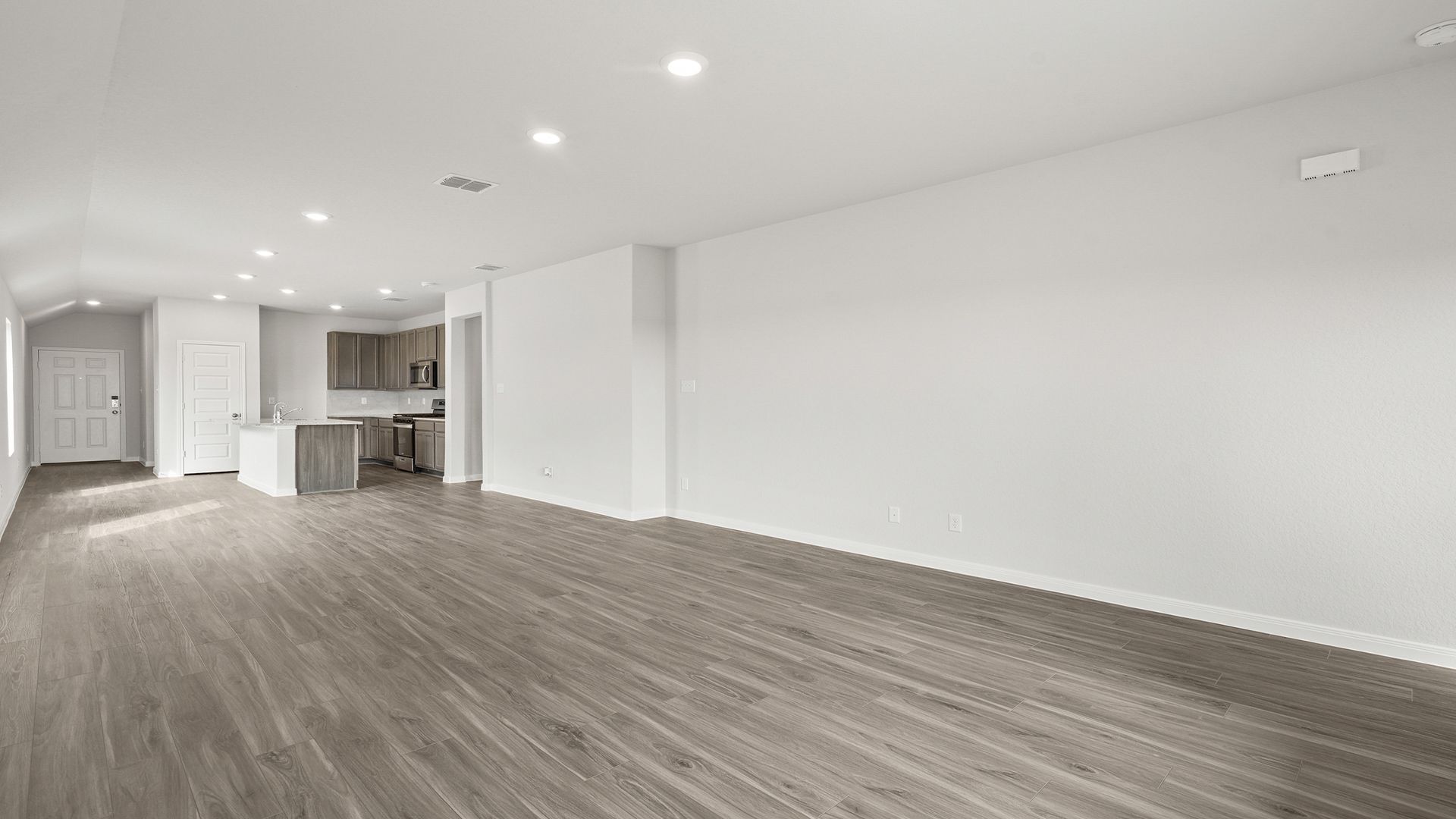 Family room to dining area and kitchen