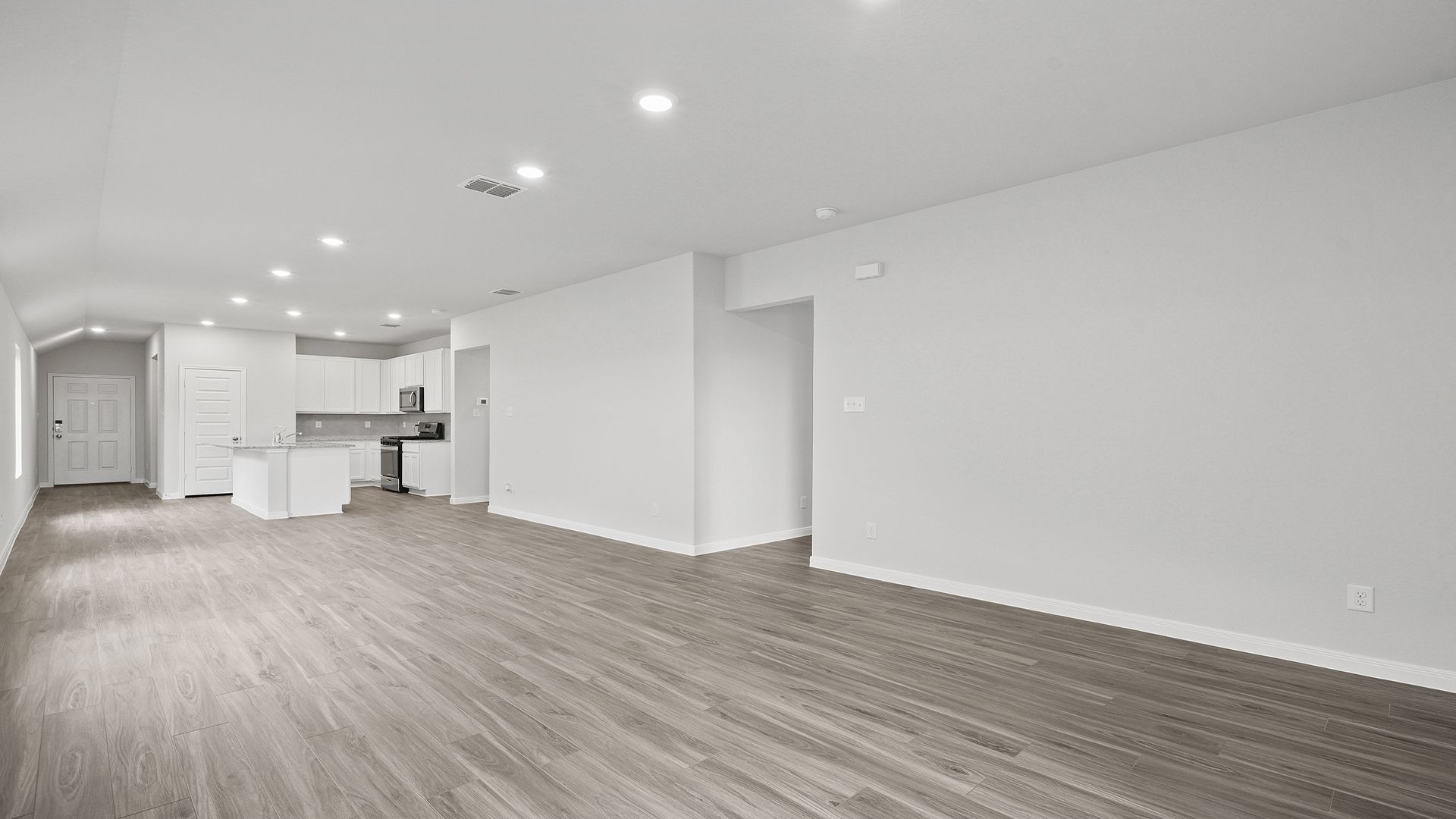 Family room to dining area and kitchen