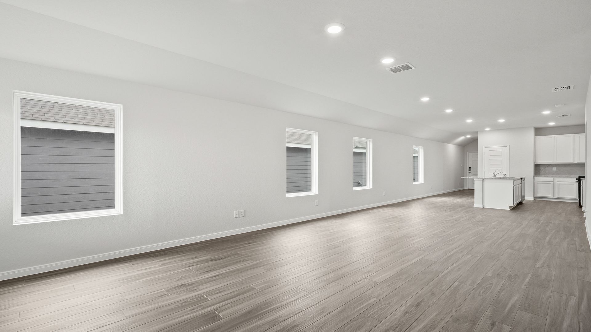 Family room to dining area and kitchen