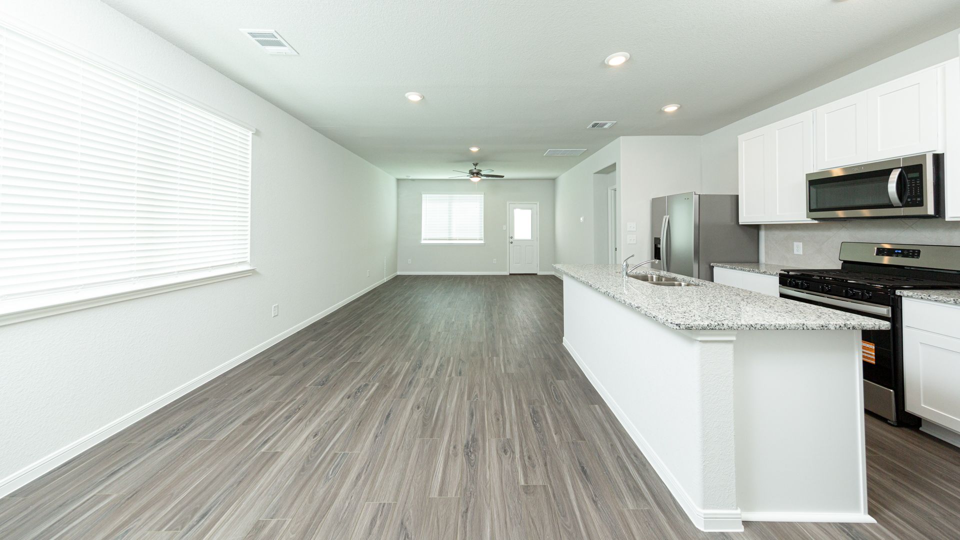 Dining Area and Kitchen to Family Room