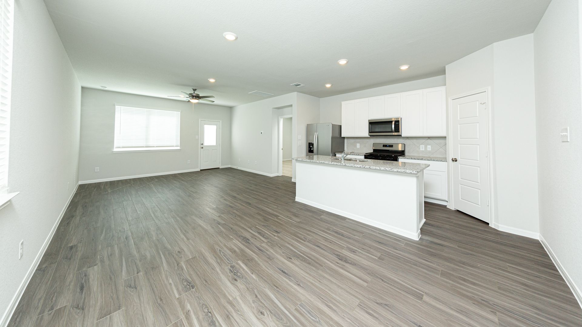 Dining Area and Kitchen to Family Room