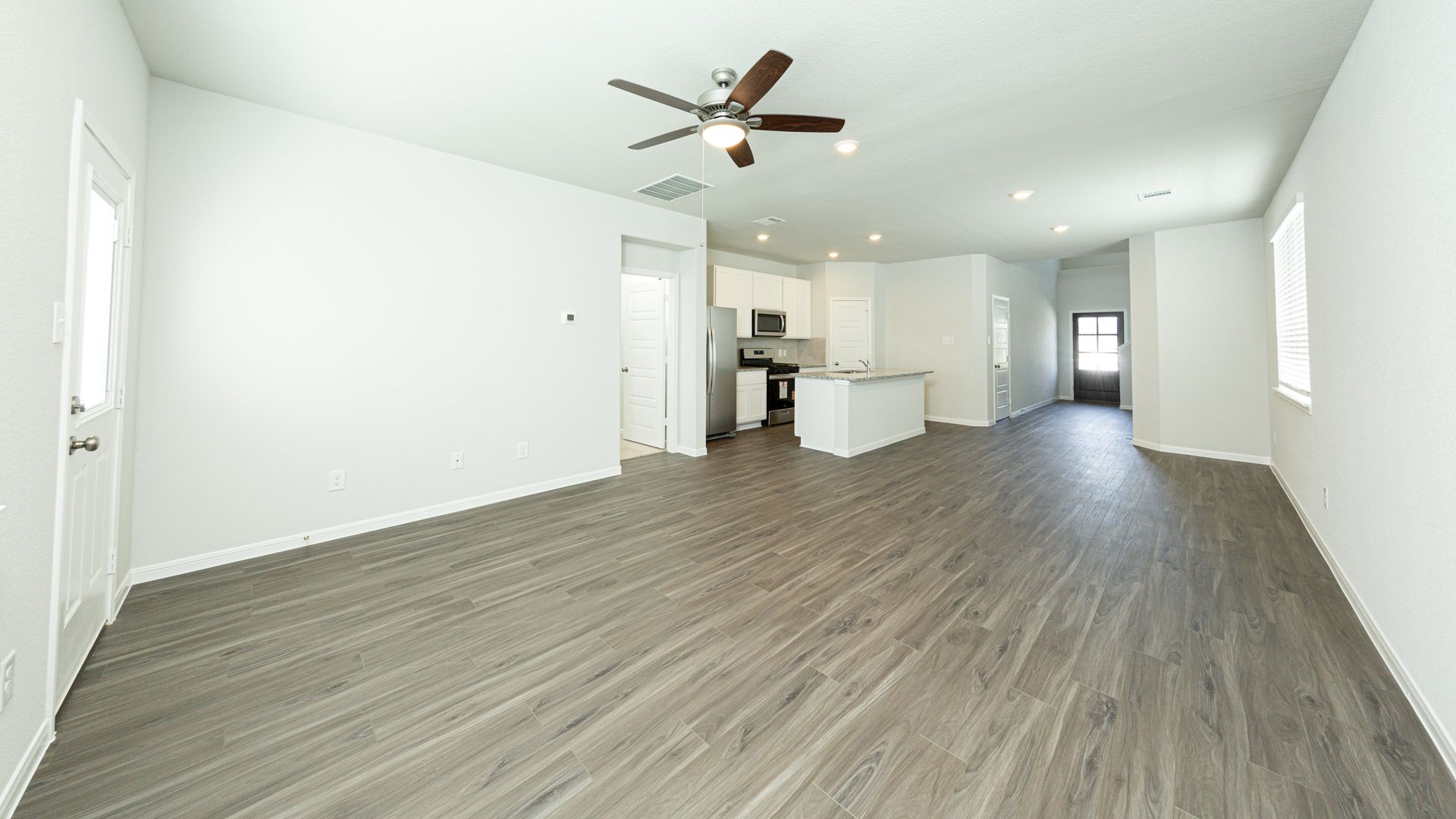 Family Room to Dining Area and Kitchen