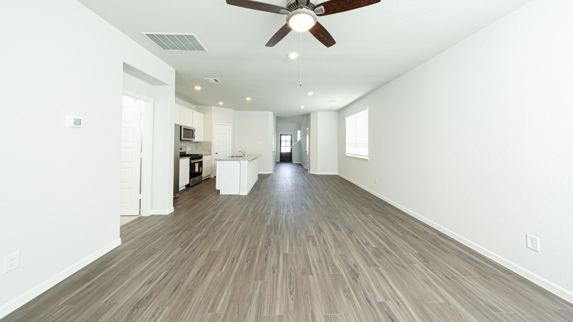 Family Room to Dining Area and Kitchen