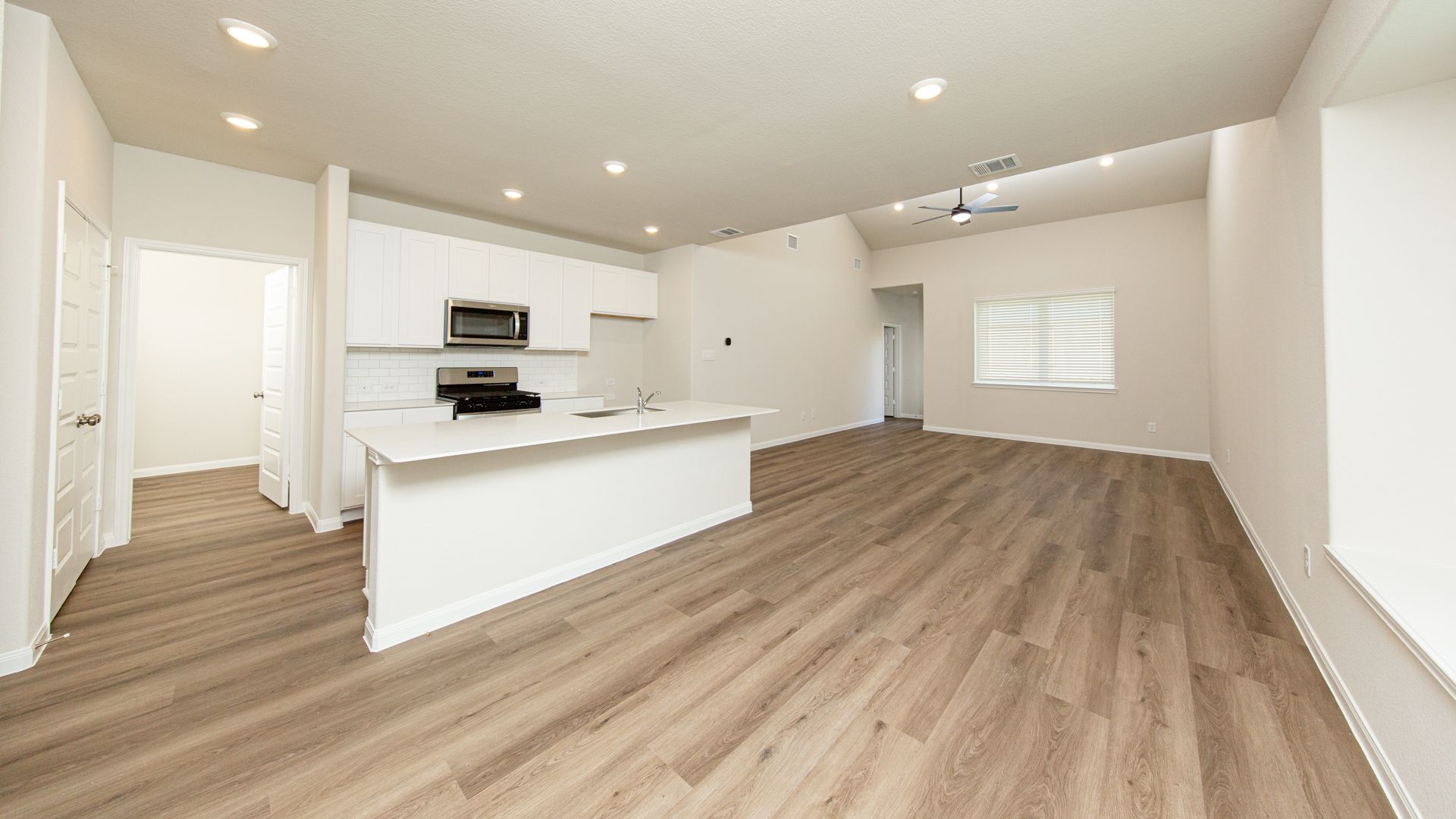 Dining Area and Kitchen to Family Room
