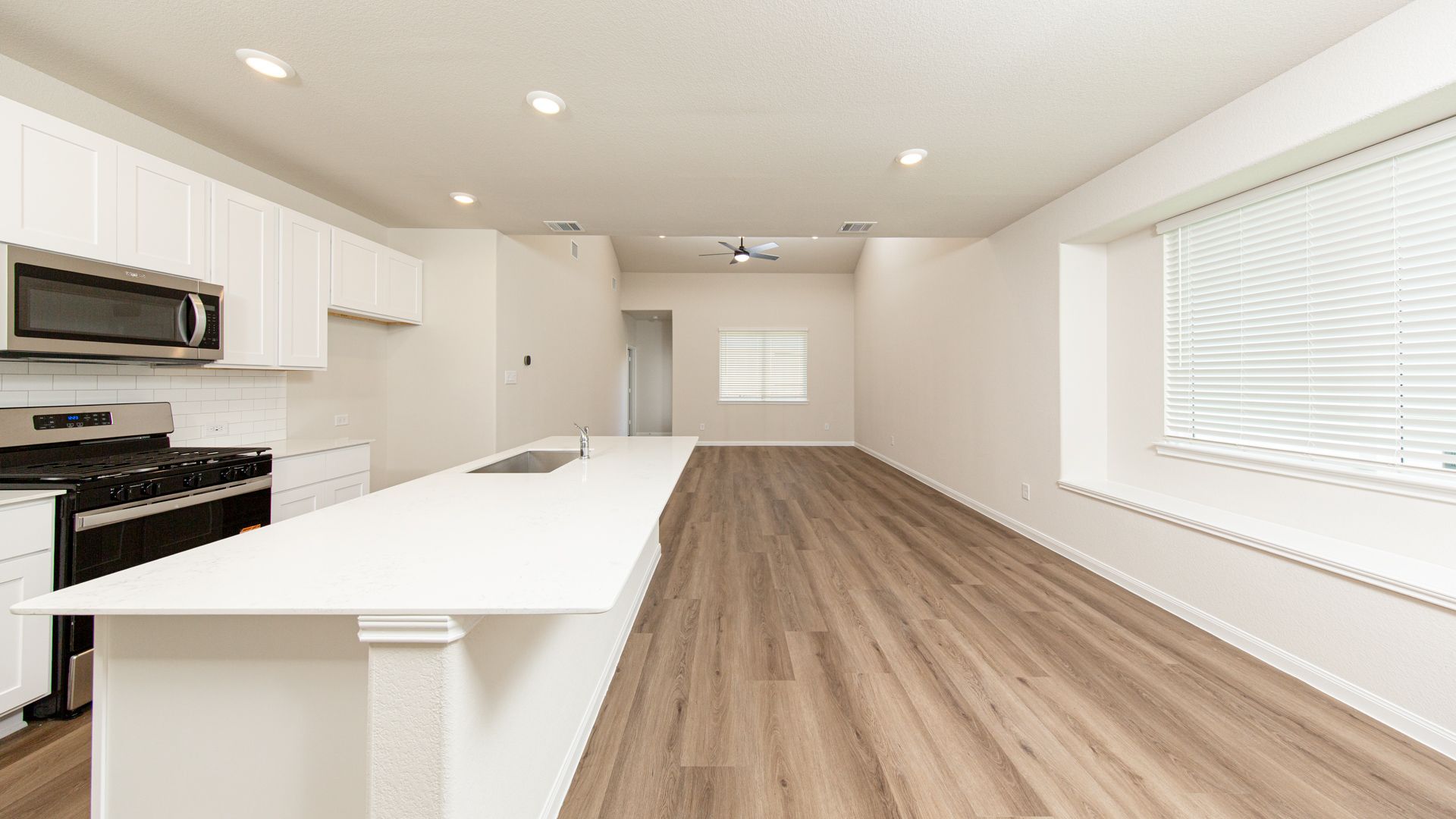 Kitchen and Dining Area to Family Room