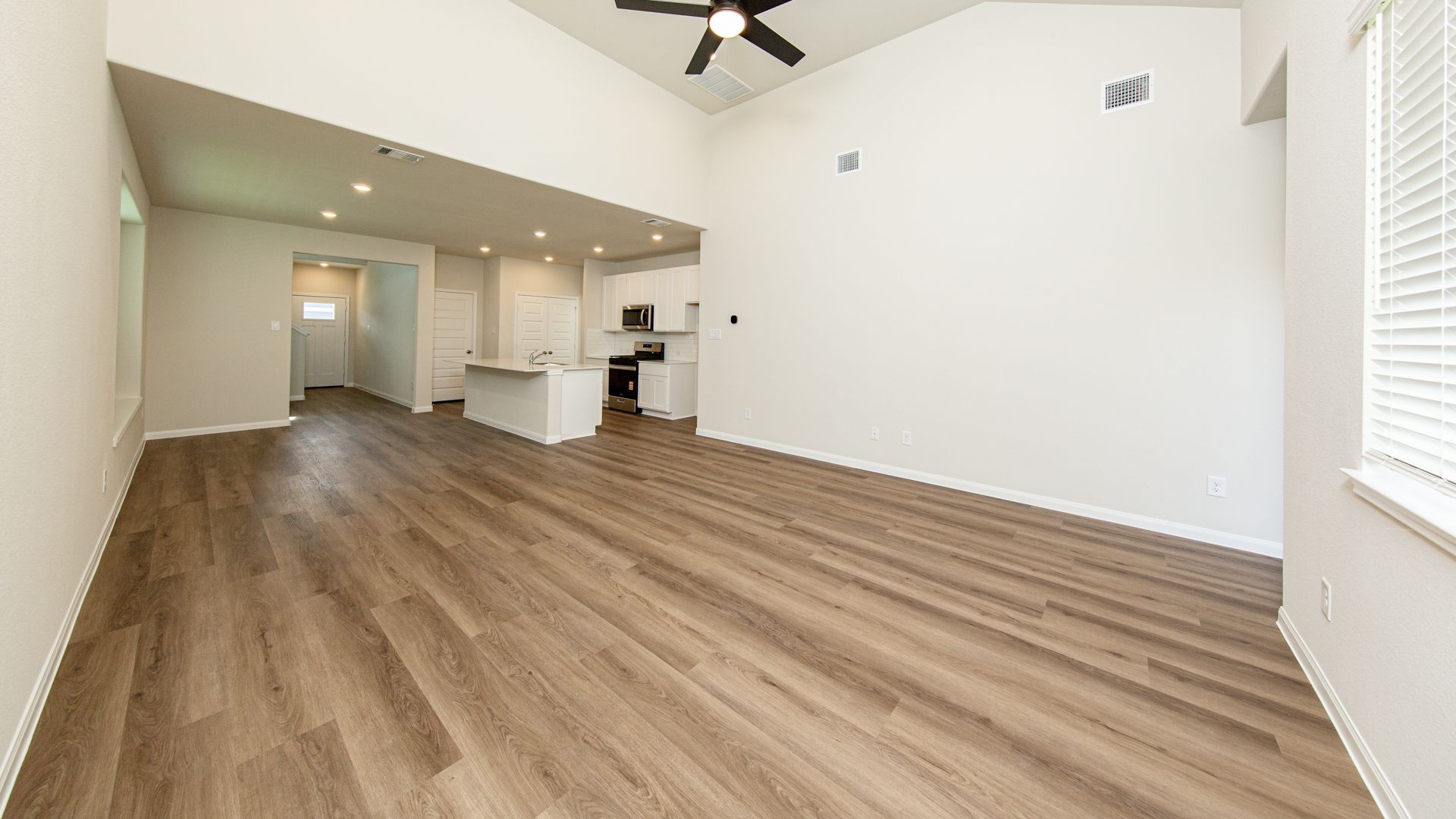Family Room to Kitchen and Dining Area