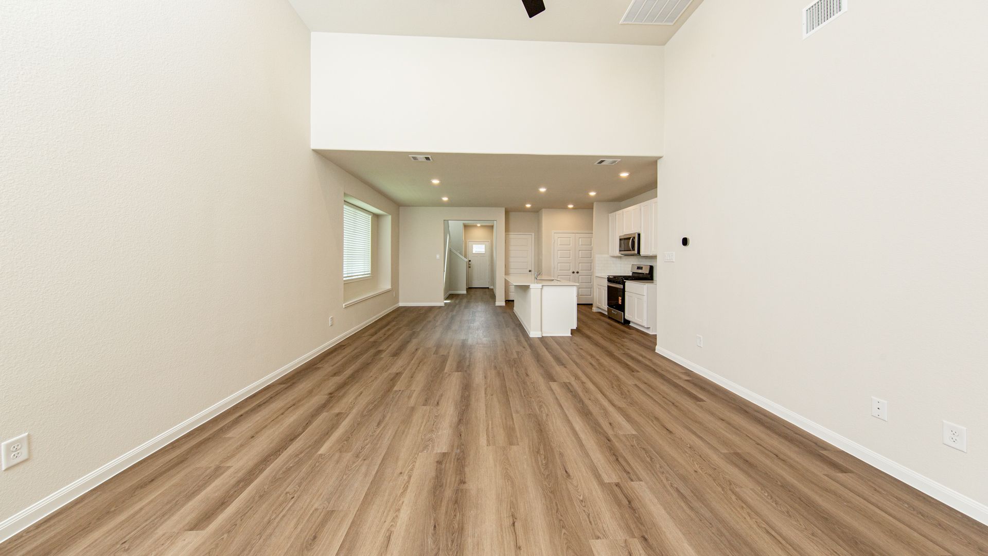 Family Room to Kitchen and Dining Area