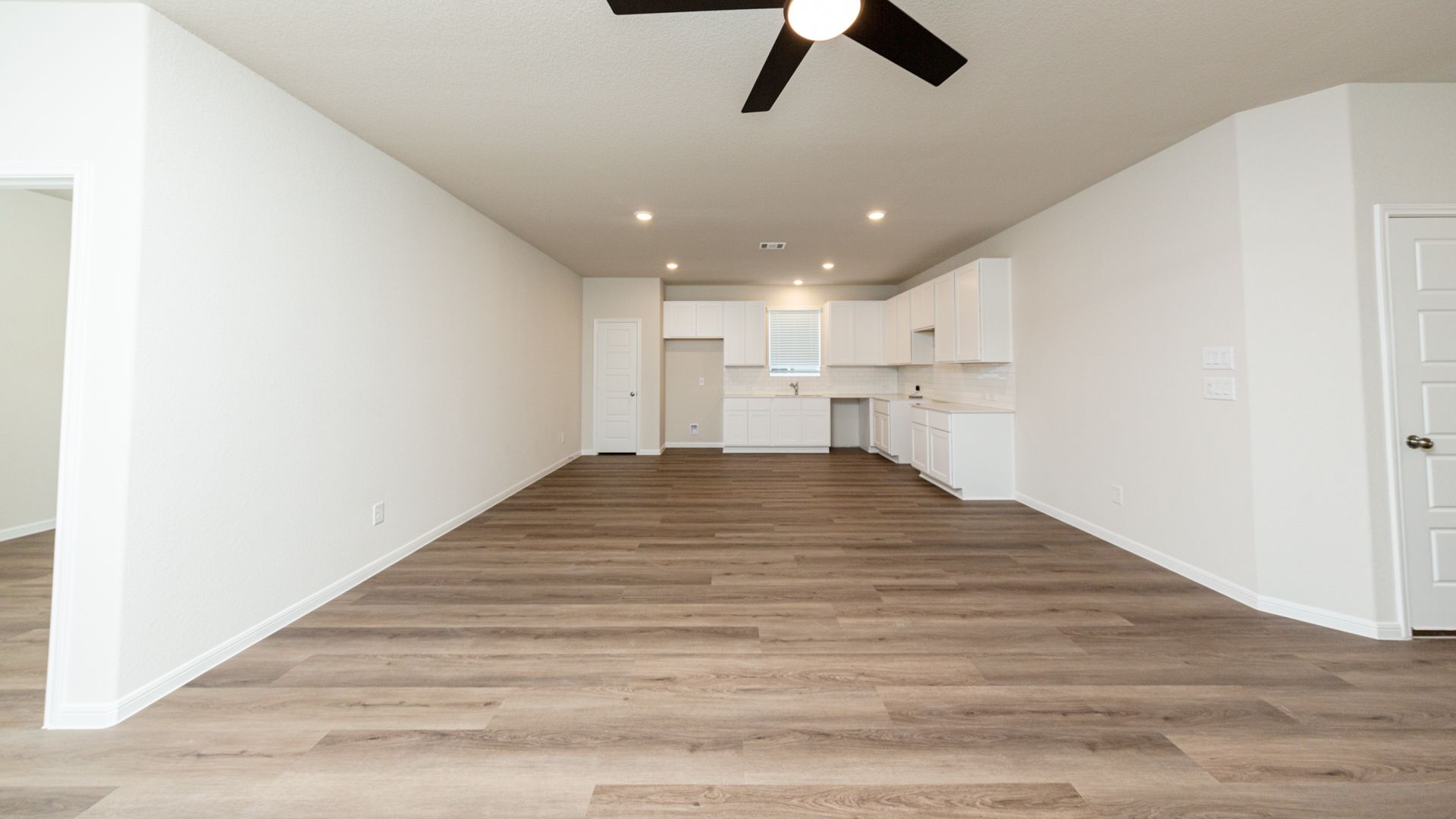 Family Room to Dining Area and Kitchen